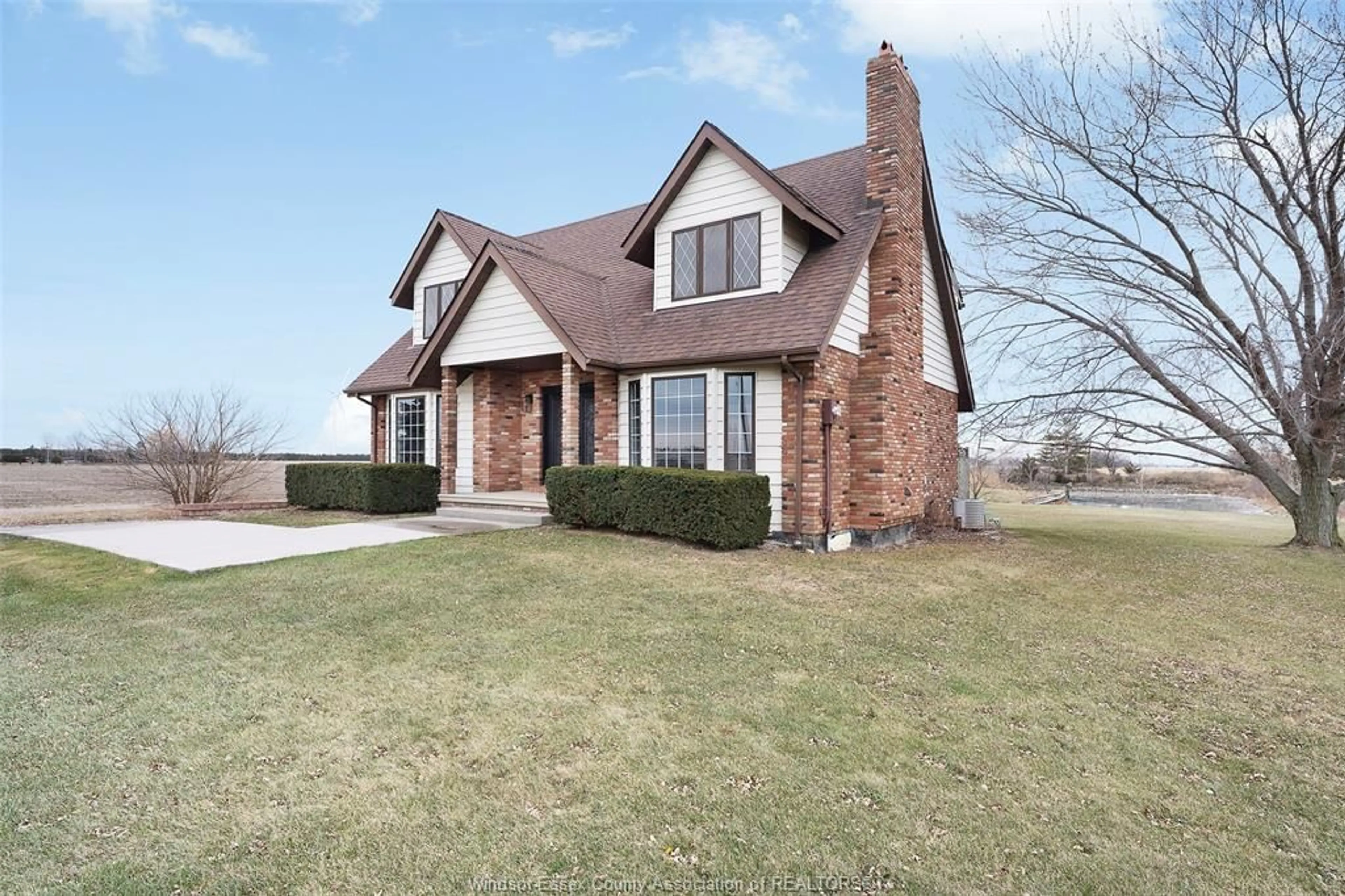 Home with brick exterior material, street for 2989 LAKESHORE RD 305, Comber Ontario N0R 1J0