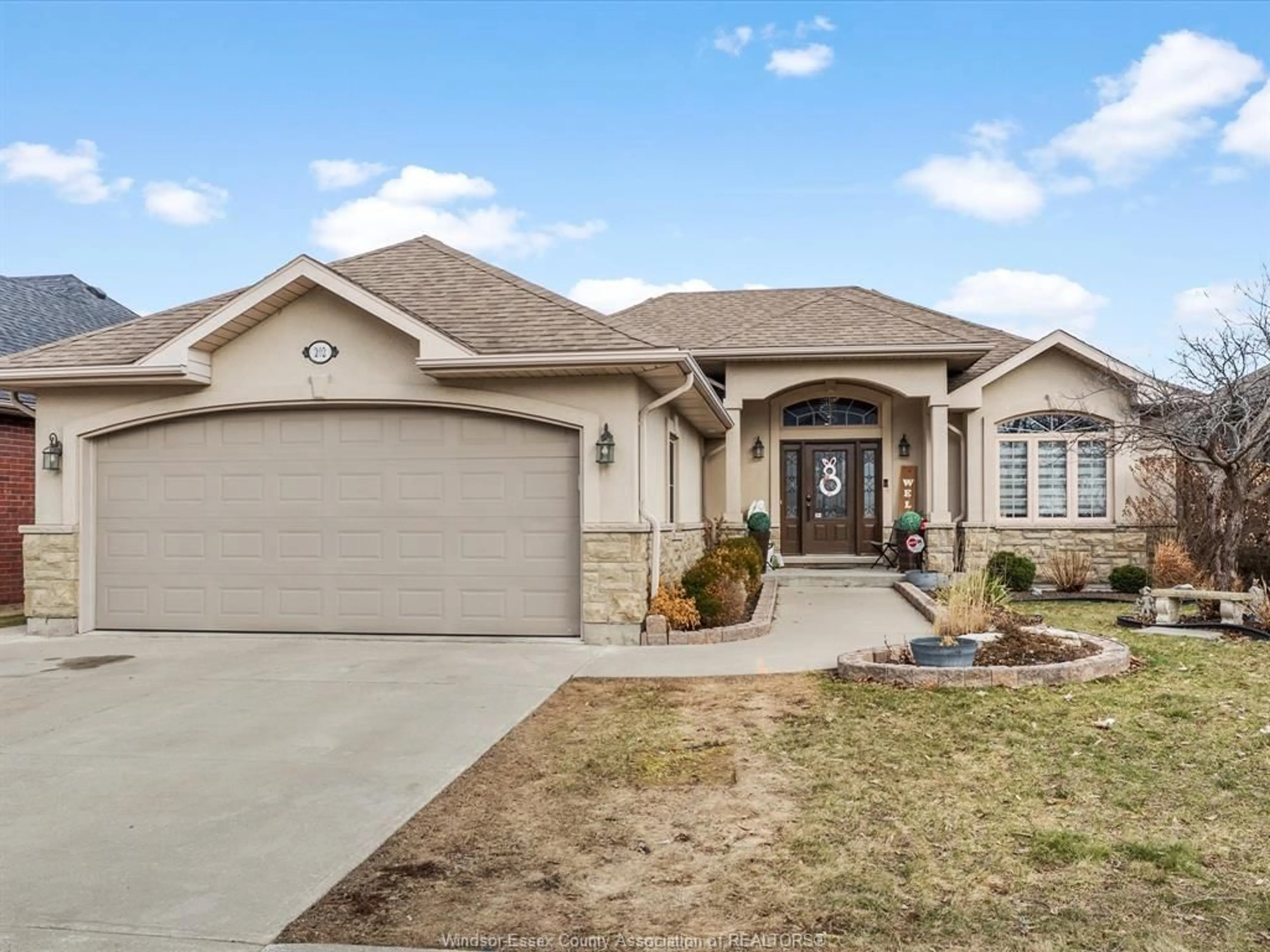 Home with vinyl exterior material, street for 202 ELLISON, Leamington Ontario N8H 0B2