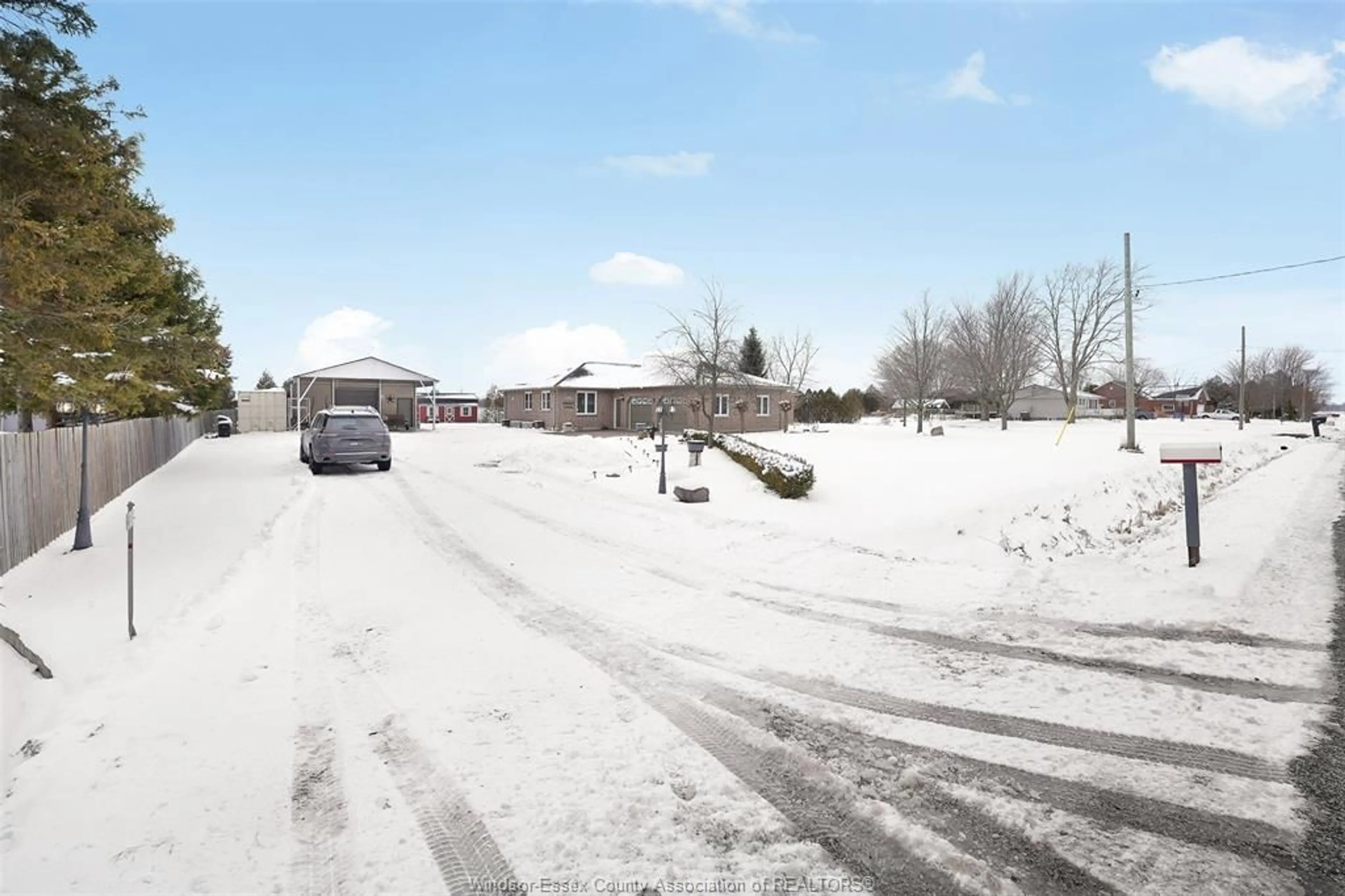 A pic from outside/outdoor area/front of a property/back of a property/a pic from drone, street for 224 MERSEA RD 7, Leamington Ontario N8H 3V8