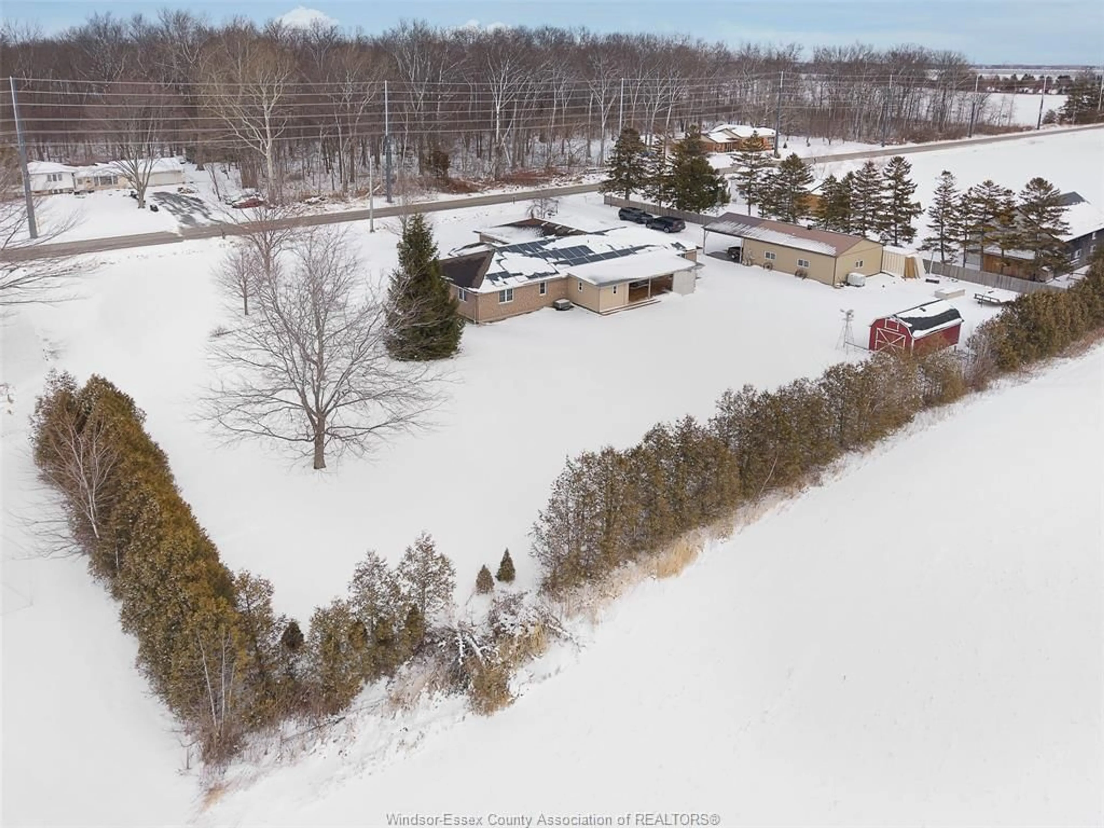 A pic from outside/outdoor area/front of a property/back of a property/a pic from drone, unknown for 224 MERSEA RD 7, Leamington Ontario N8H 3V8