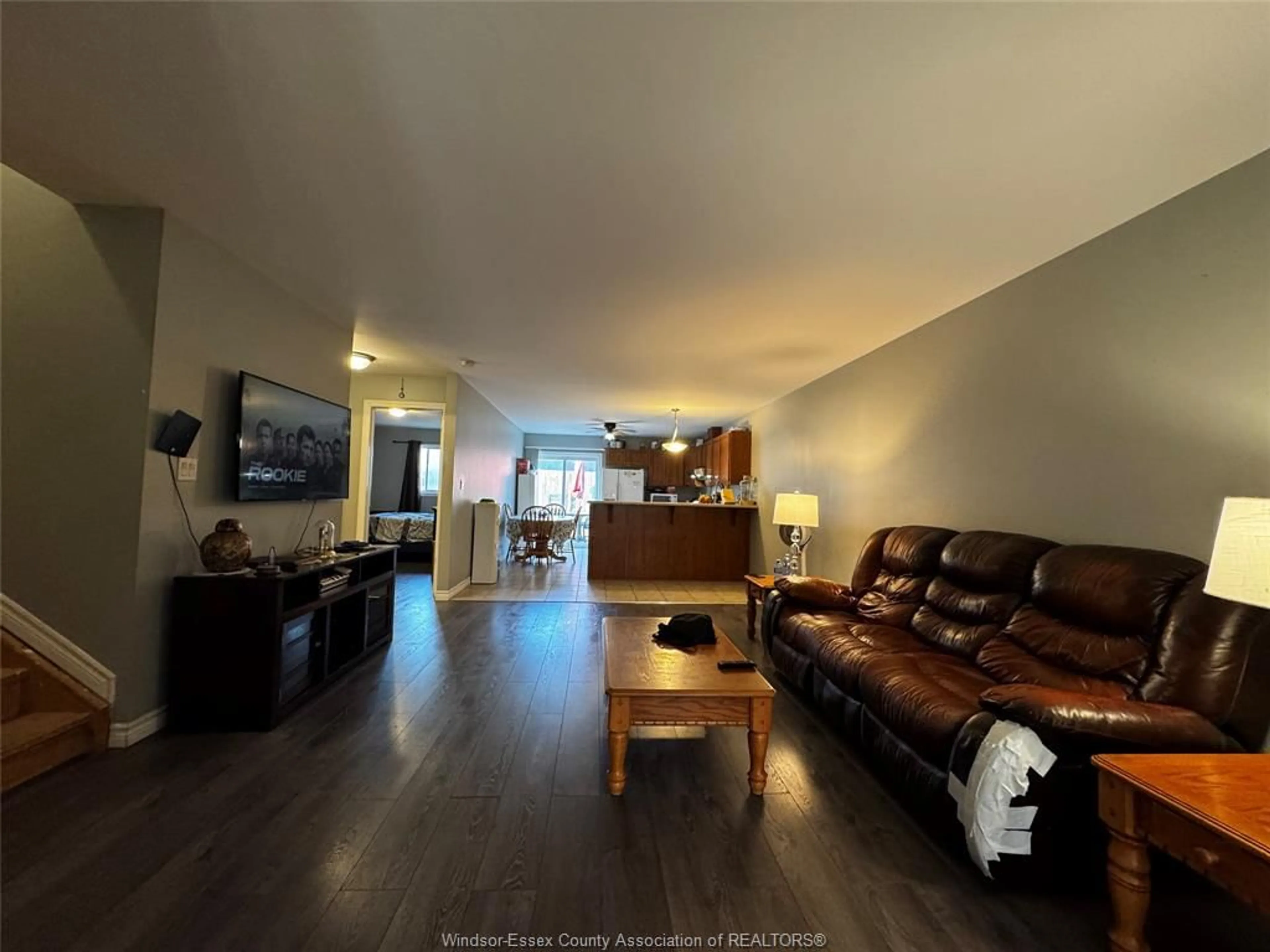 Living room with furniture, wood/laminate floor for 11814 ROCKLAND St, Windsor Ontario N8P 1Z9