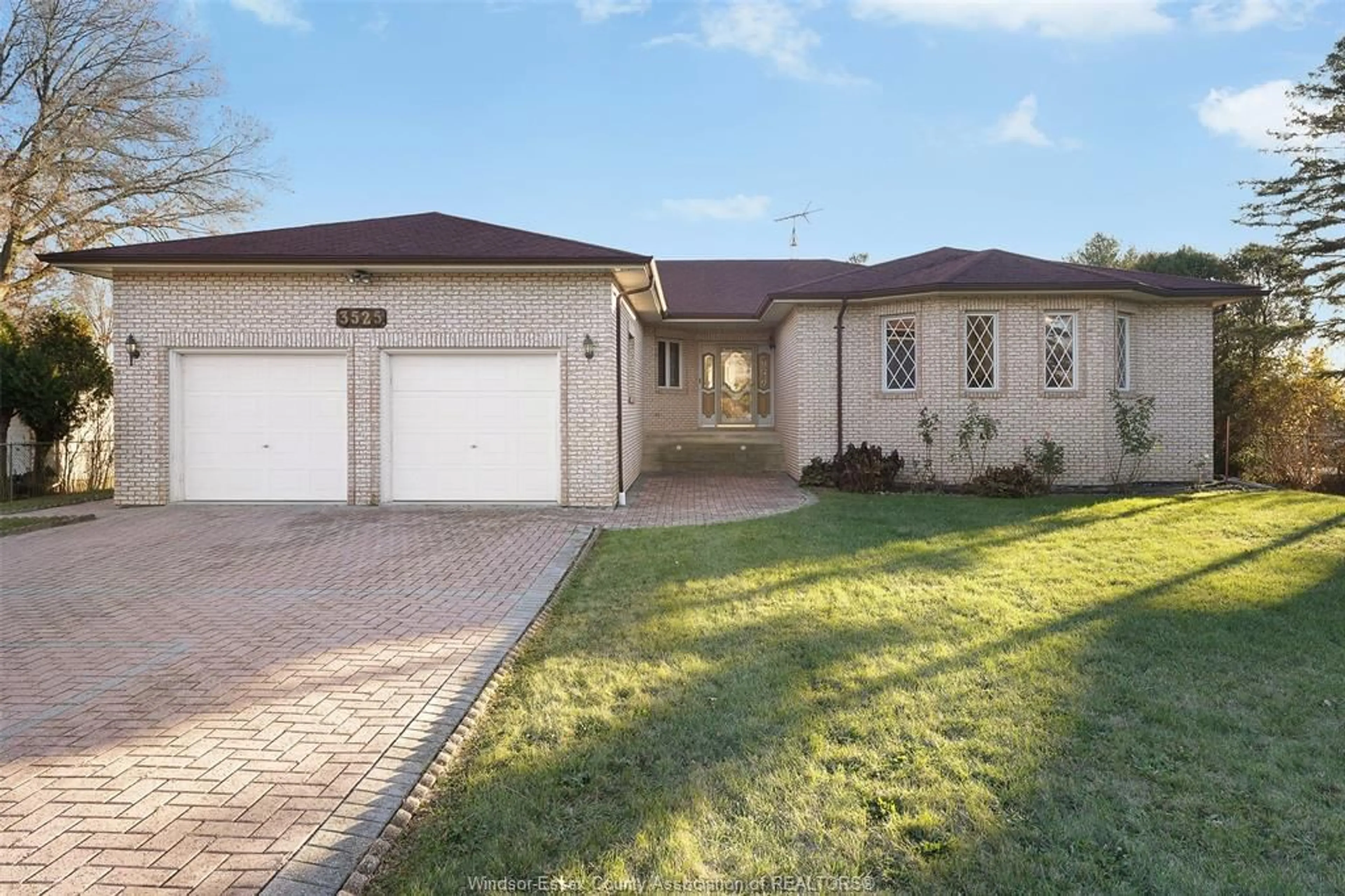 Home with brick exterior material, street for 3525 Baseline Rd, Windsor Ontario N8V 0A2