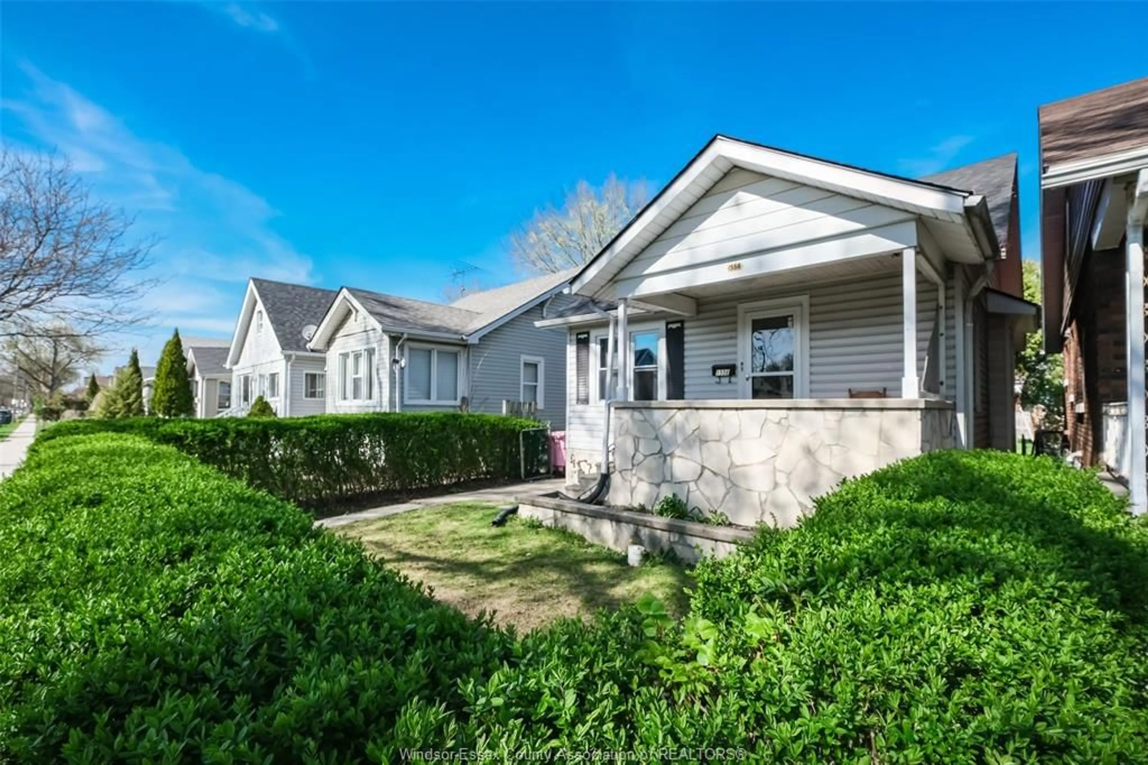 Home with vinyl exterior material, street for 1556 GLADSTONE Ave, Windsor Ontario N8X 2R1