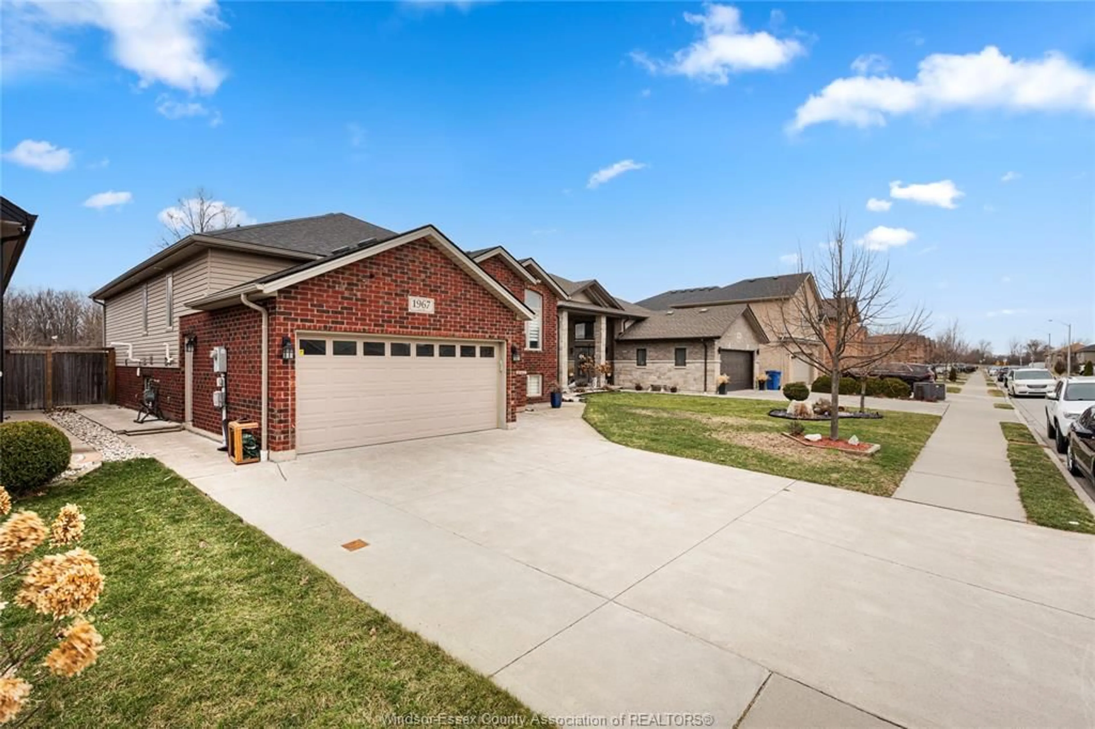 Home with brick exterior material, street for 1967 Mark Ave, Windsor Ontario N9B 0B9