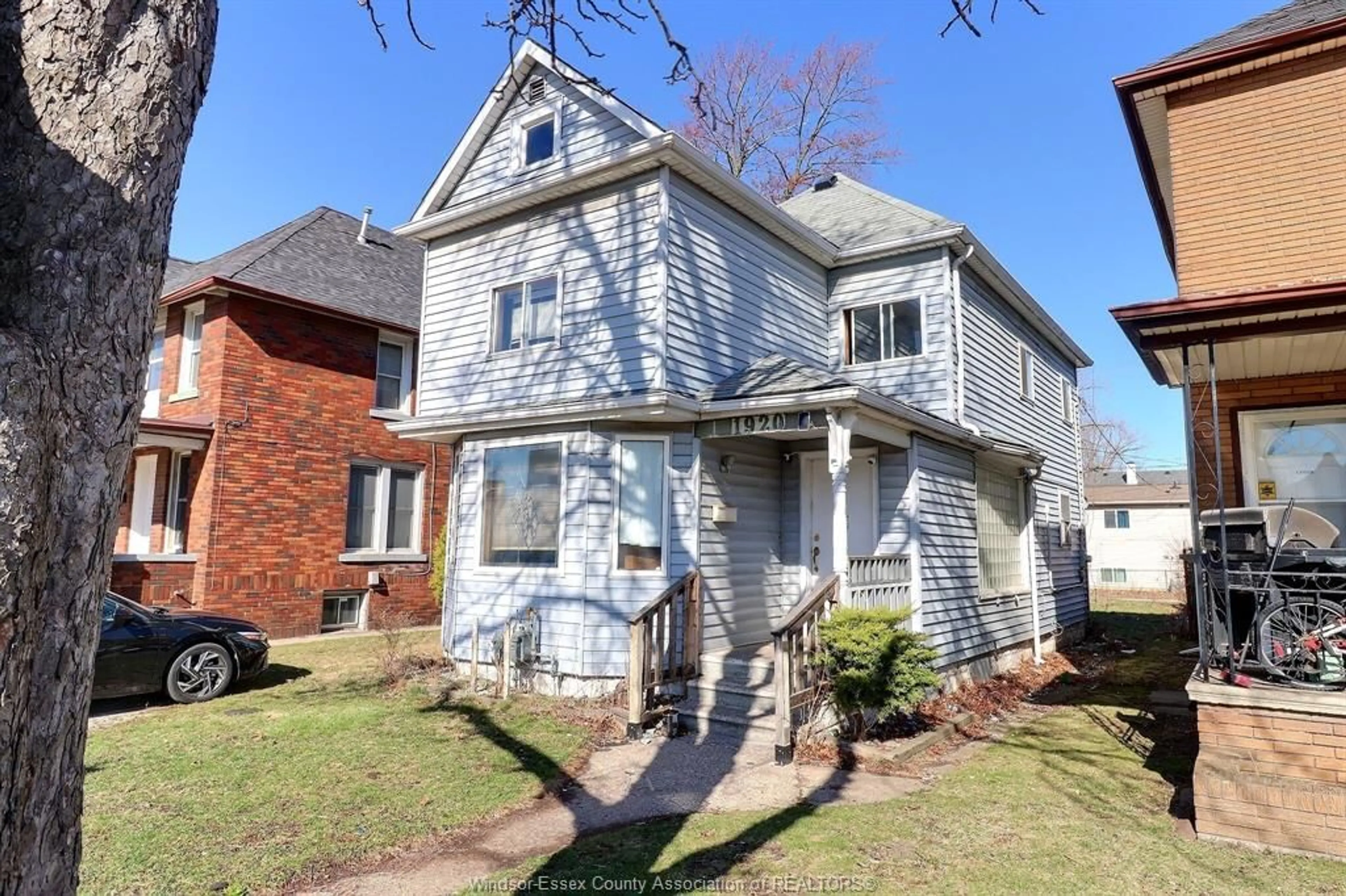 Home with brick exterior material, street for 1920 UNIVERSITY Ave, Windsor Ontario N9B 1C8