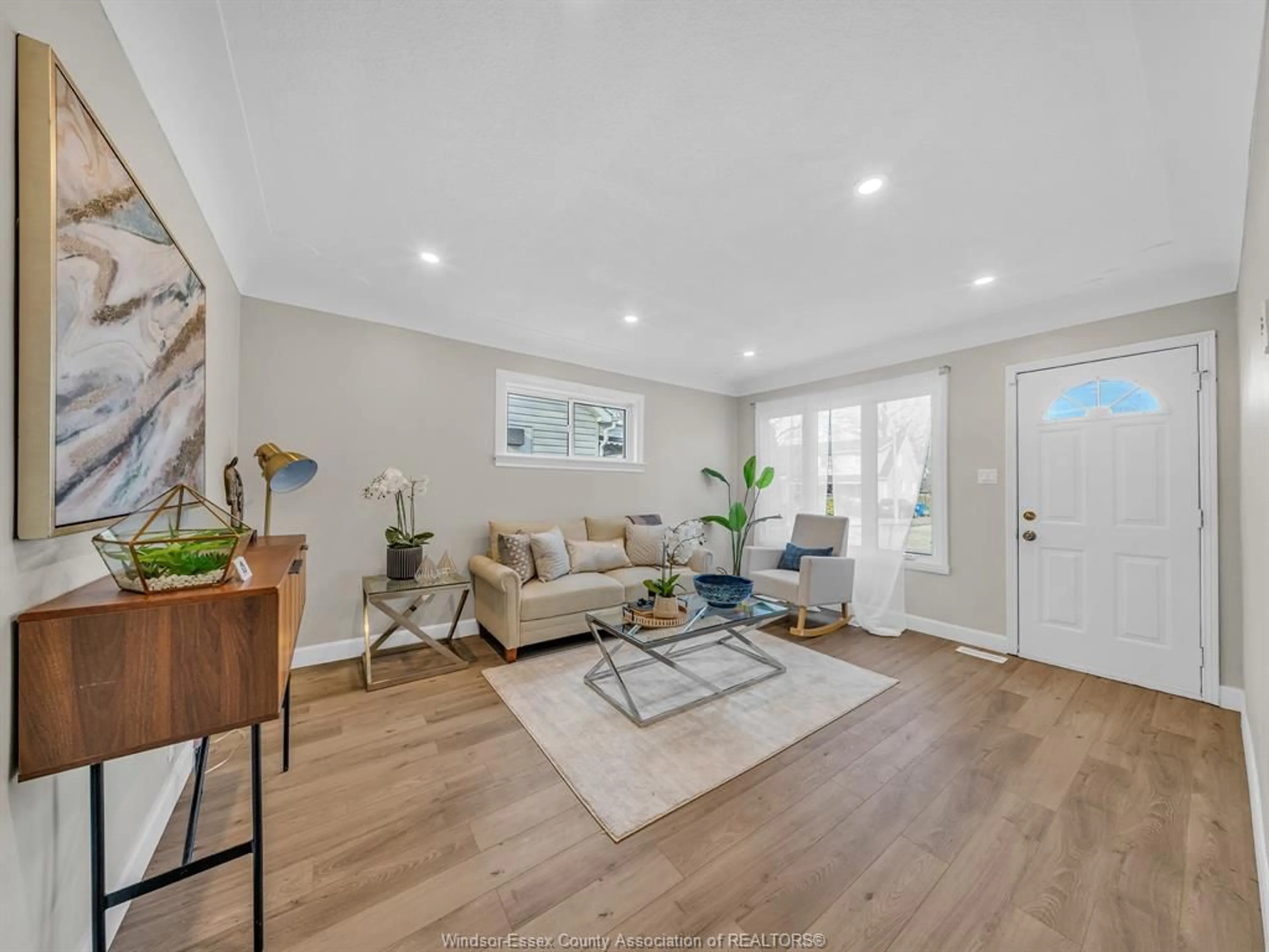 Living room with furniture, wood/laminate floor for 683 STANLEY, Windsor Ontario N8X 3B3