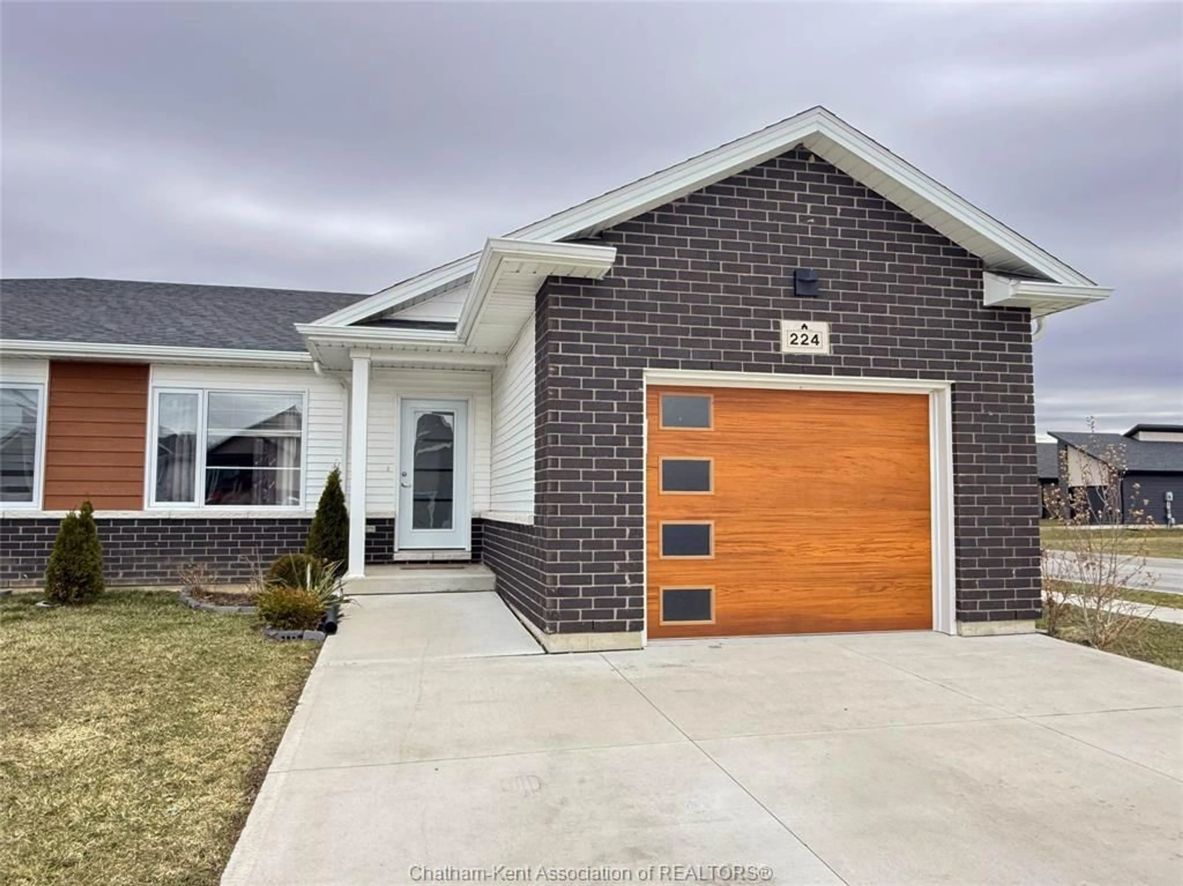 Home with brick exterior material, street for 224 Manning Dr, Chatham Ontario N7M 0S5