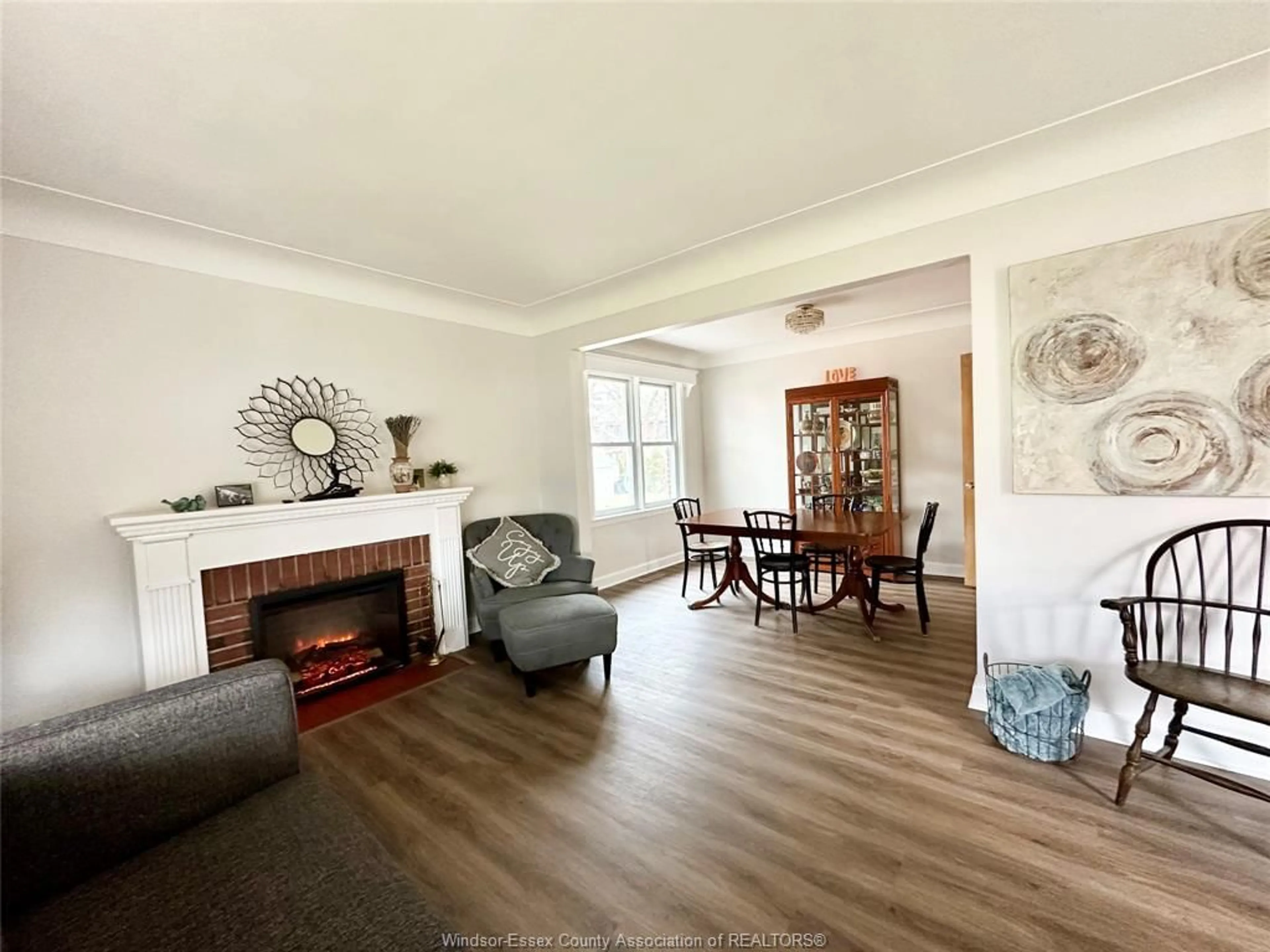 Living room with furniture, wood/laminate floor for 854 BELLEPERCHE Pl, Windsor Ontario N8S 3C1