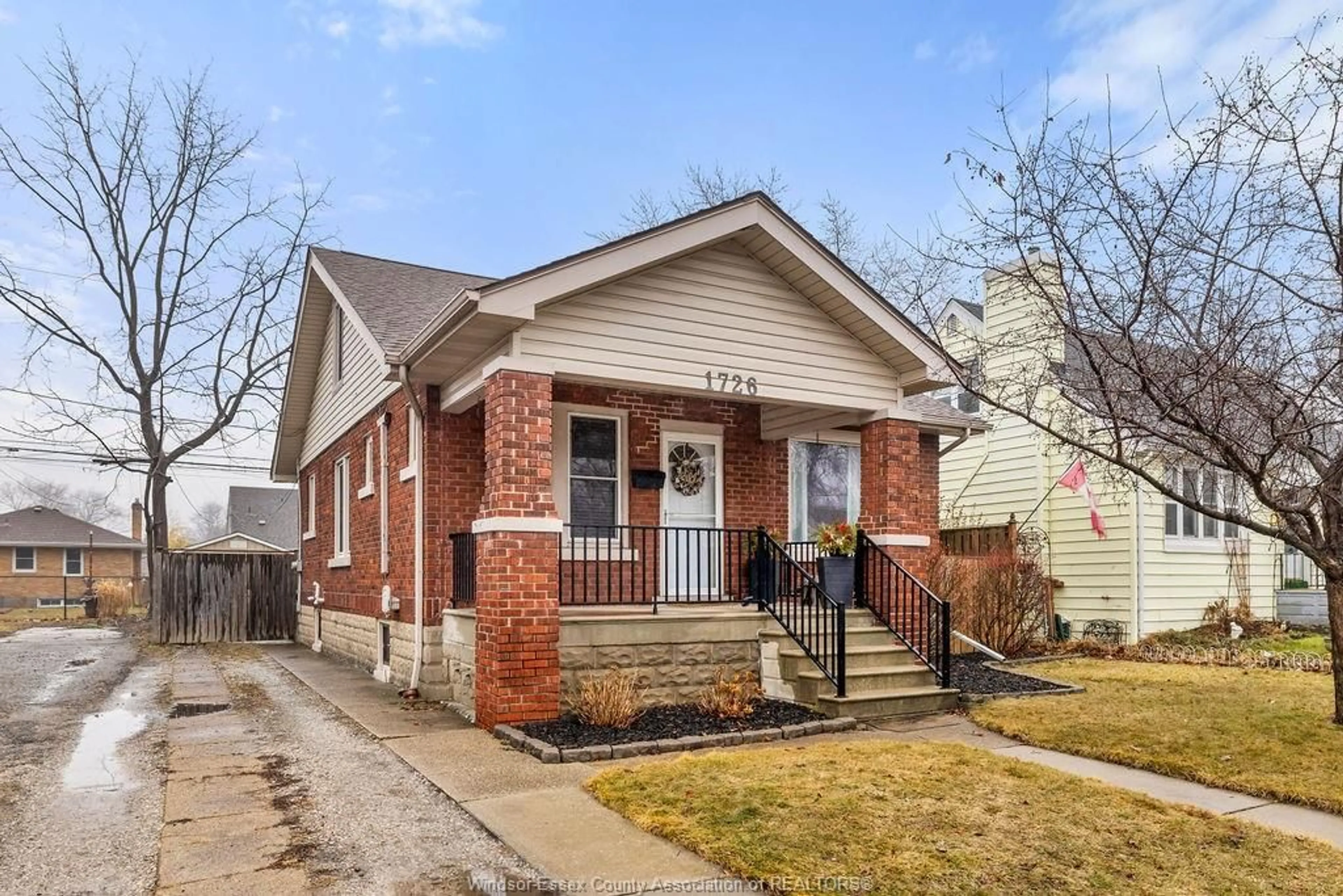 Home with brick exterior material, street for 1726 Pillette Rd, Windsor Ontario N8G 3C6