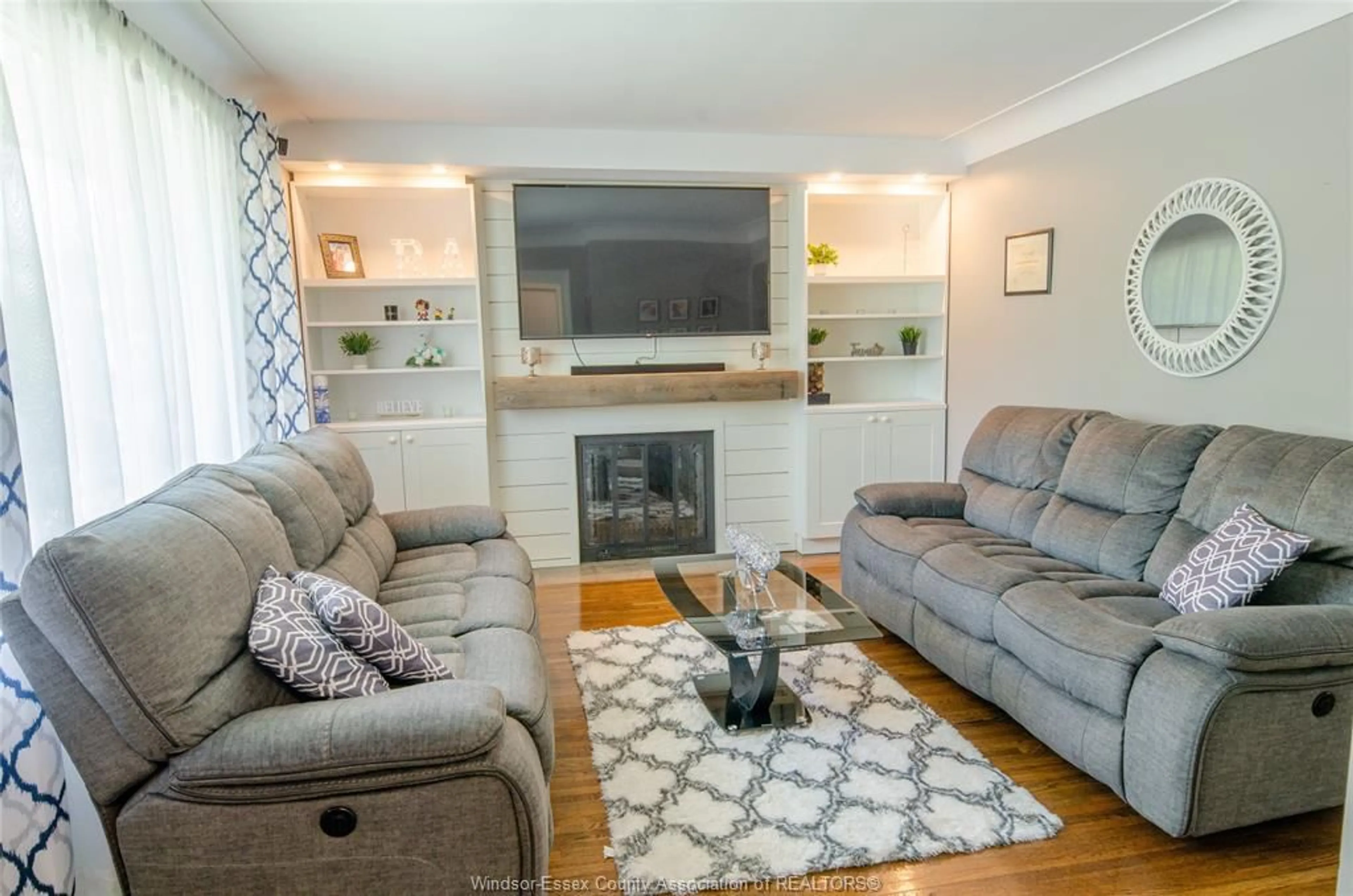 Living room with furniture, wood/laminate floor for 1077 FAIRVIEW, Windsor Ontario N8S 3E6