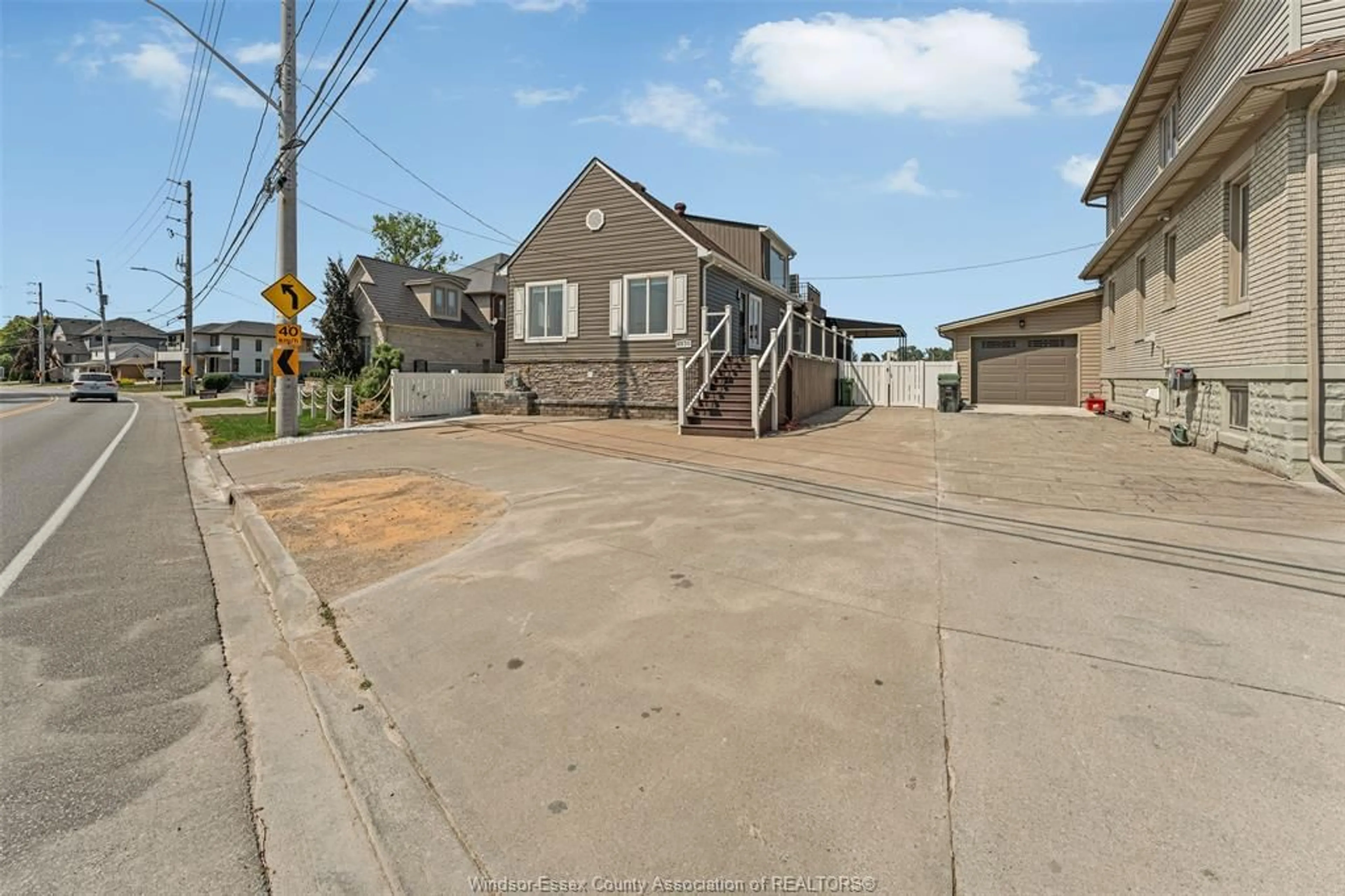 A pic from outside/outdoor area/front of a property/back of a property/a pic from drone, street for 8830 RIVERSIDE Dr, Windsor Ontario N8S 1G7