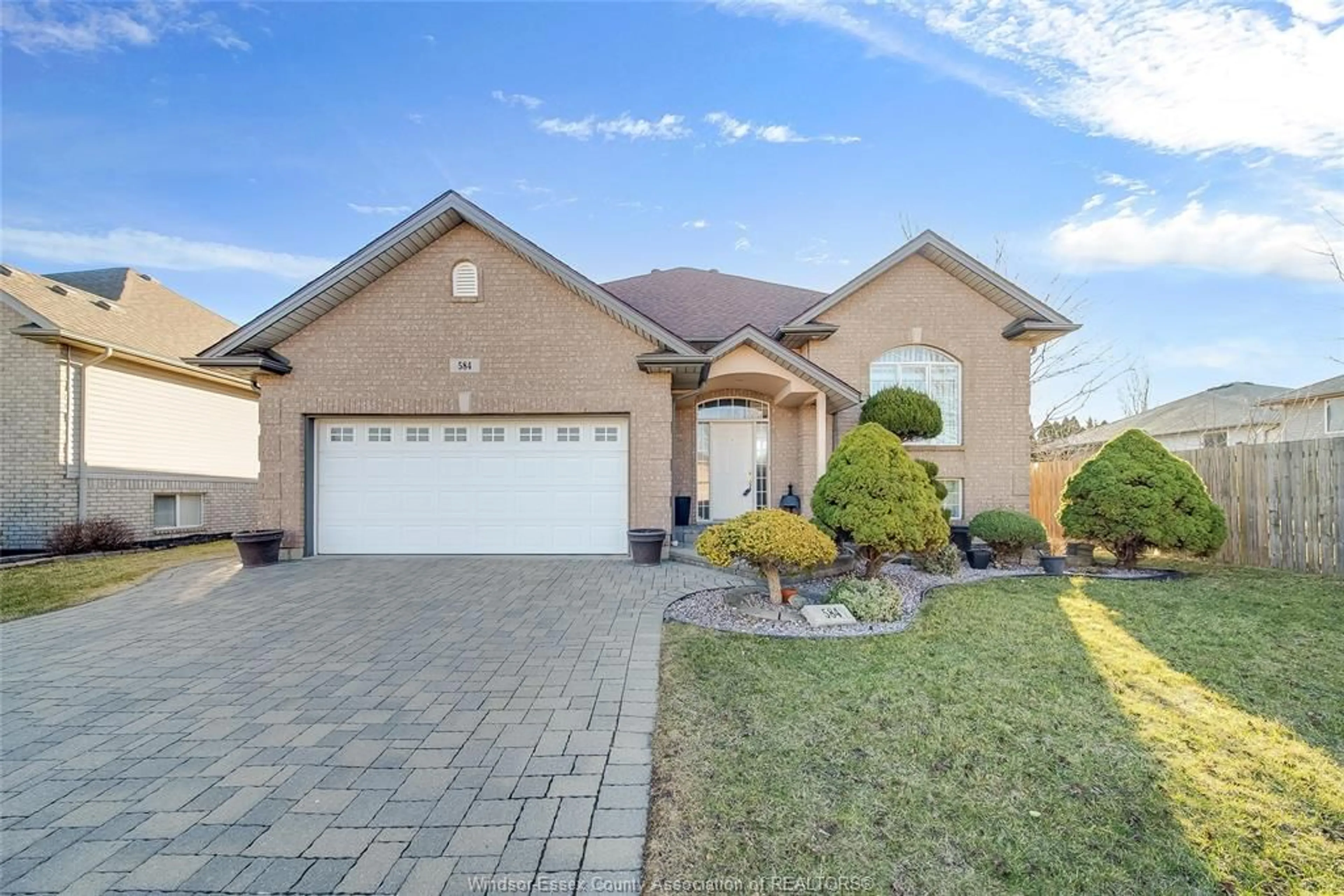 Home with brick exterior material, street for 584 BELLAGIO Dr, Windsor Ontario N8P 1J9