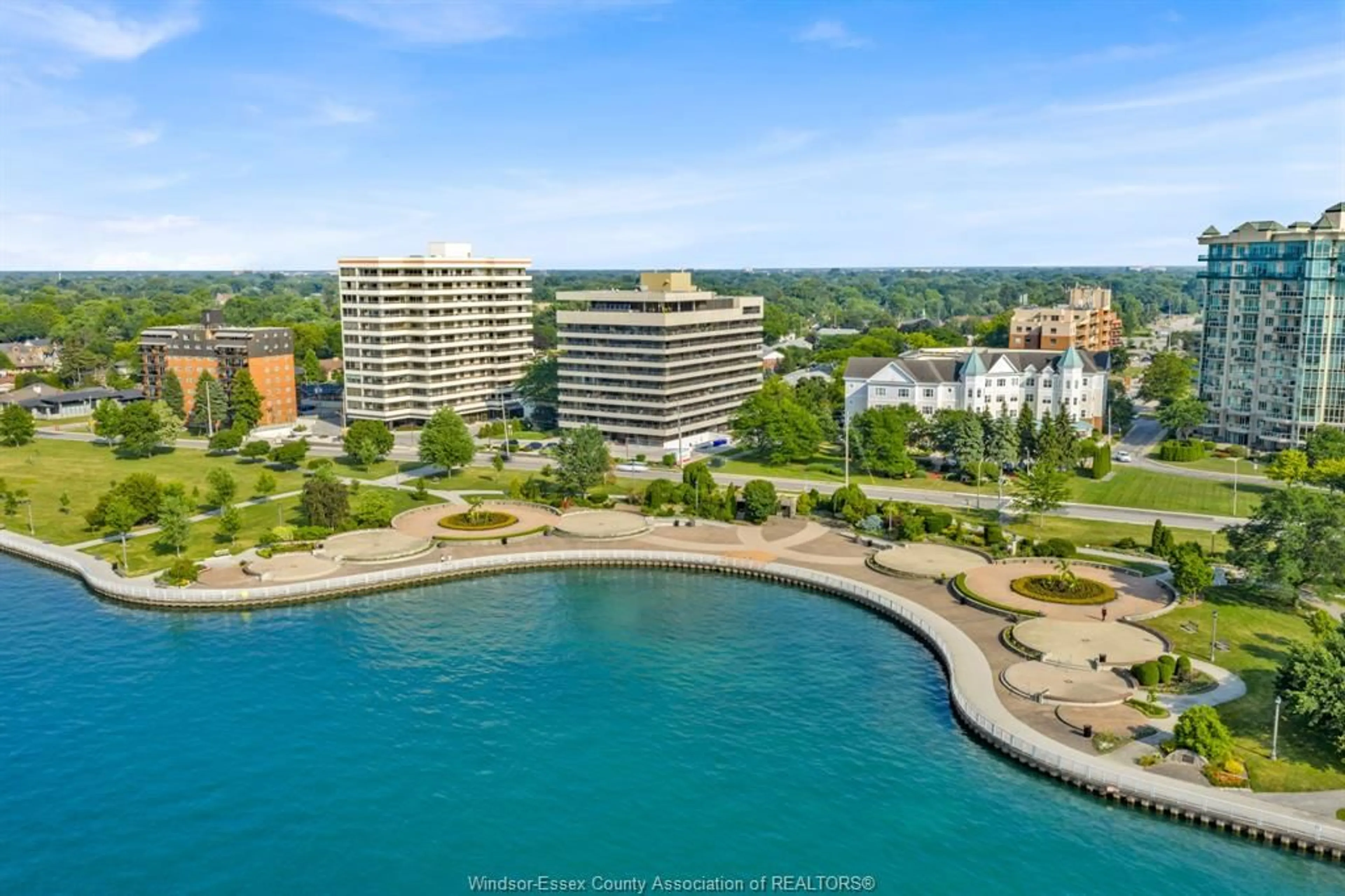 A pic from outside/outdoor area/front of a property/back of a property/a pic from drone, water/lake/river/ocean view for 5125 RIVERSIDE Dr #202, Windsor Ontario N8S 4L8