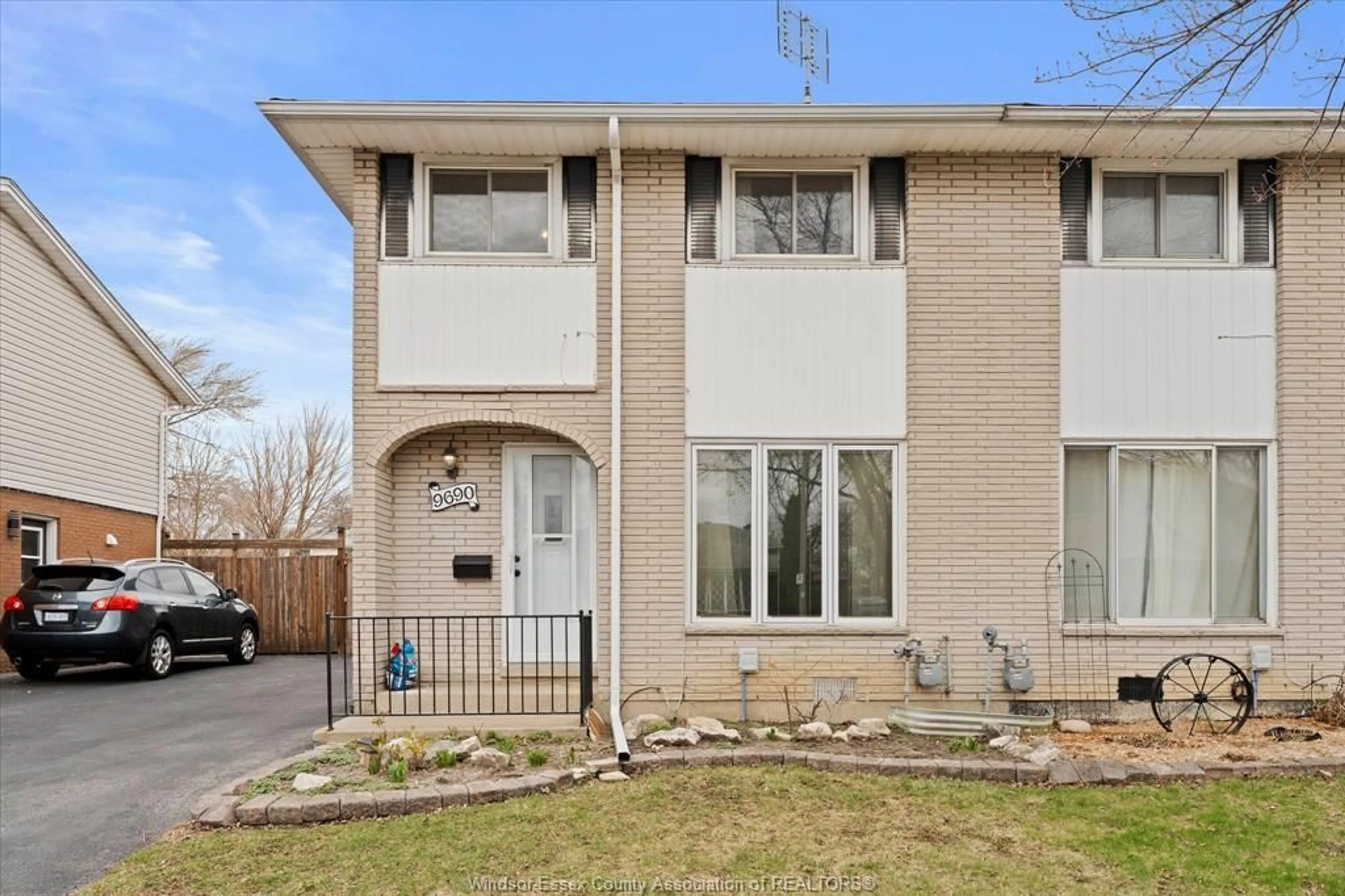 Home with brick exterior material, street for 9690 Lynngrove Cres, Windsor Ontario N8R 1B7