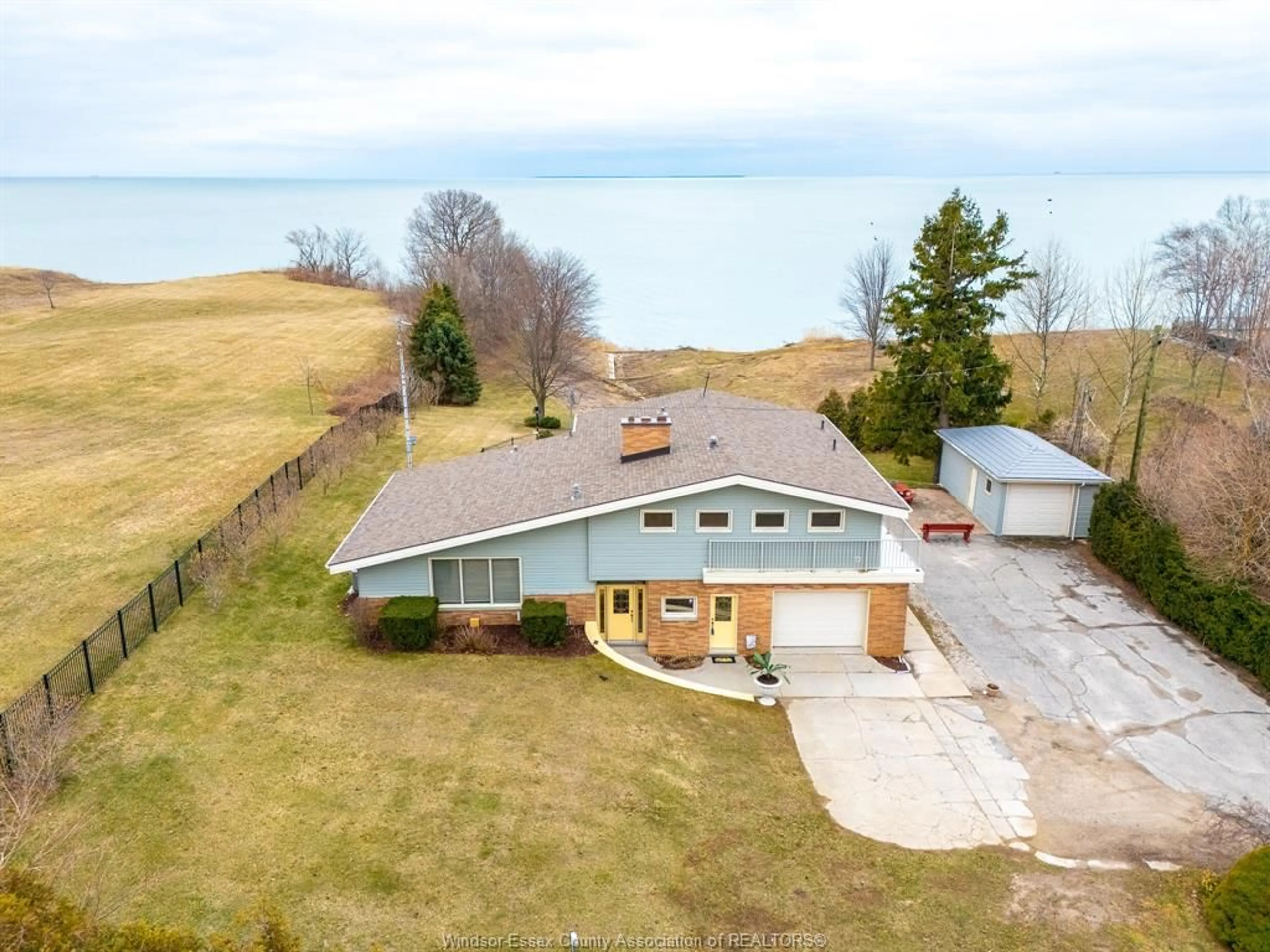 A pic from outside/outdoor area/front of a property/back of a property/a pic from drone, water/lake/river/ocean view for 340 SEACLIFF Dr, Leamington Ontario N8H 4E1
