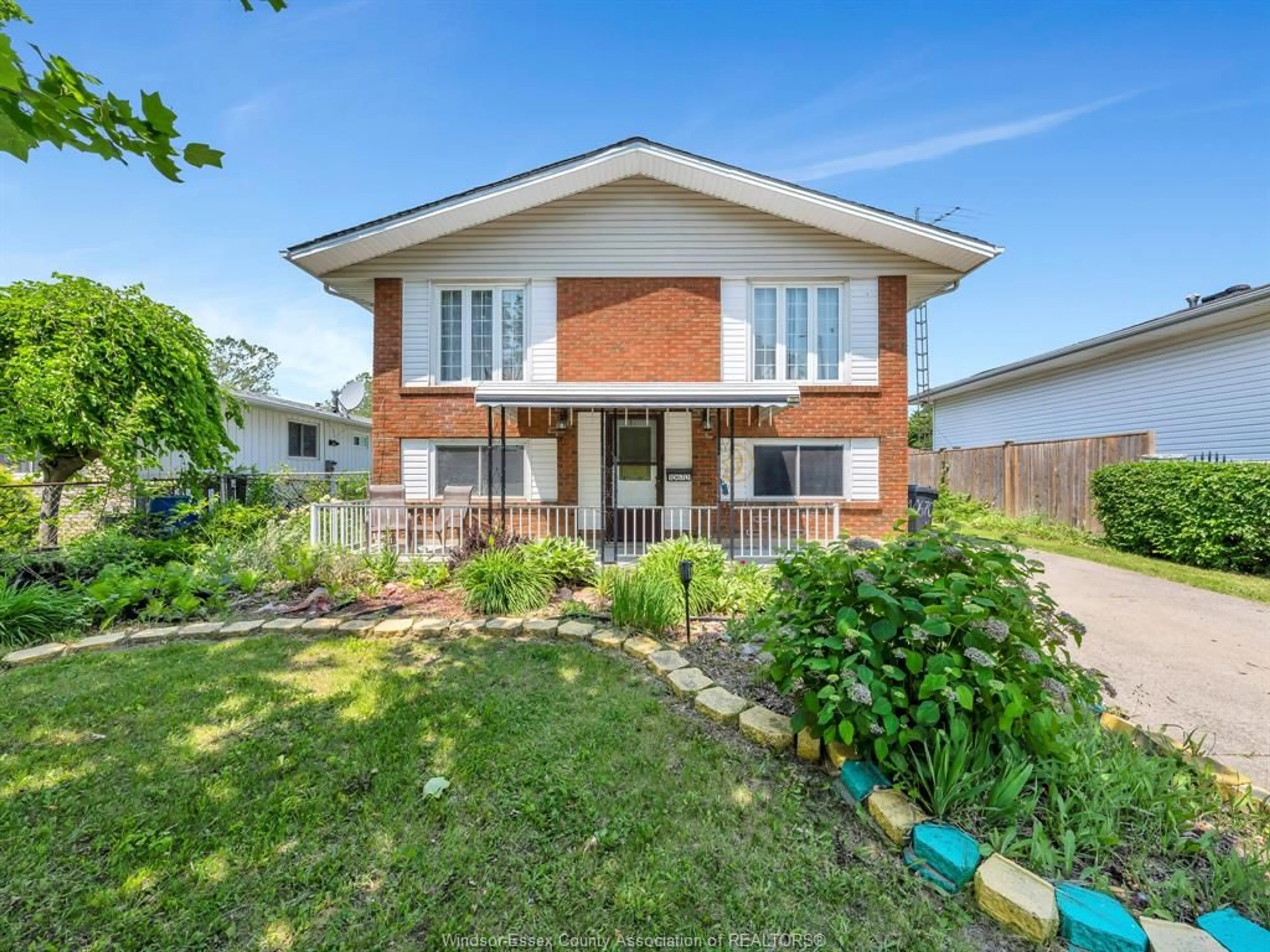 Home with brick exterior material, street for 10670 LAMBETH Rd, Windsor Ontario N8R 1C9
