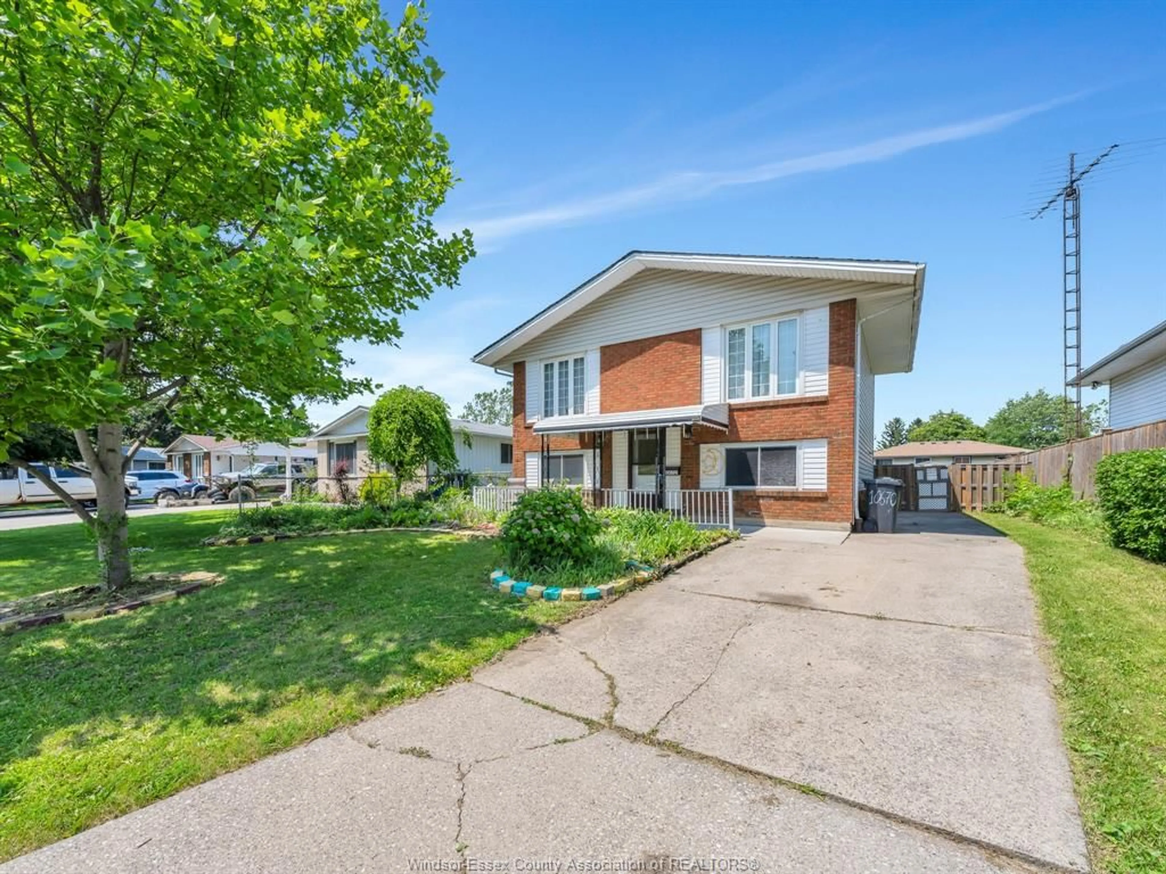 Home with brick exterior material, street for 10670 LAMBETH Rd, Windsor Ontario N8R 1C9