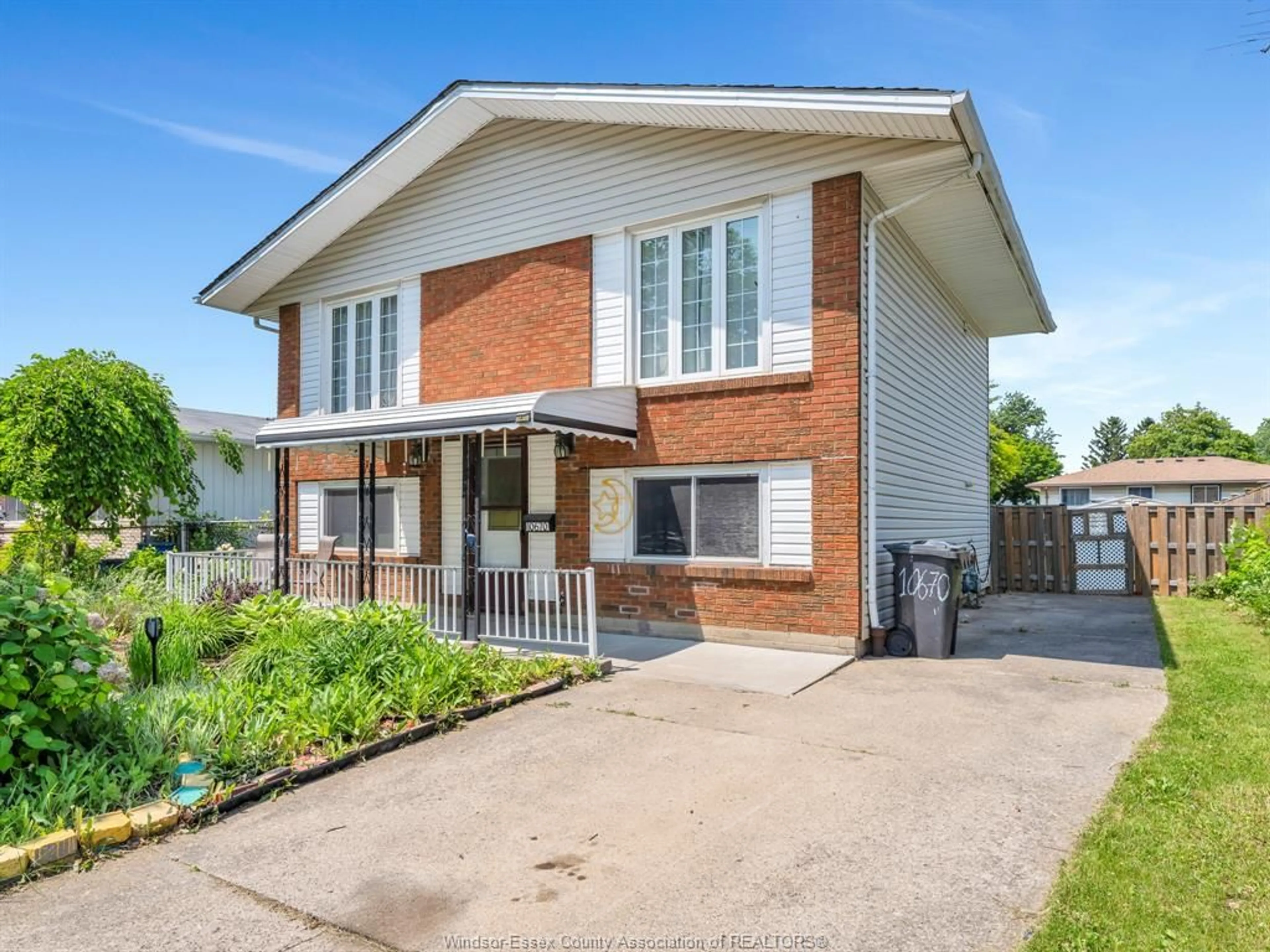 Home with brick exterior material, street for 10670 LAMBETH Rd, Windsor Ontario N8R 1C9