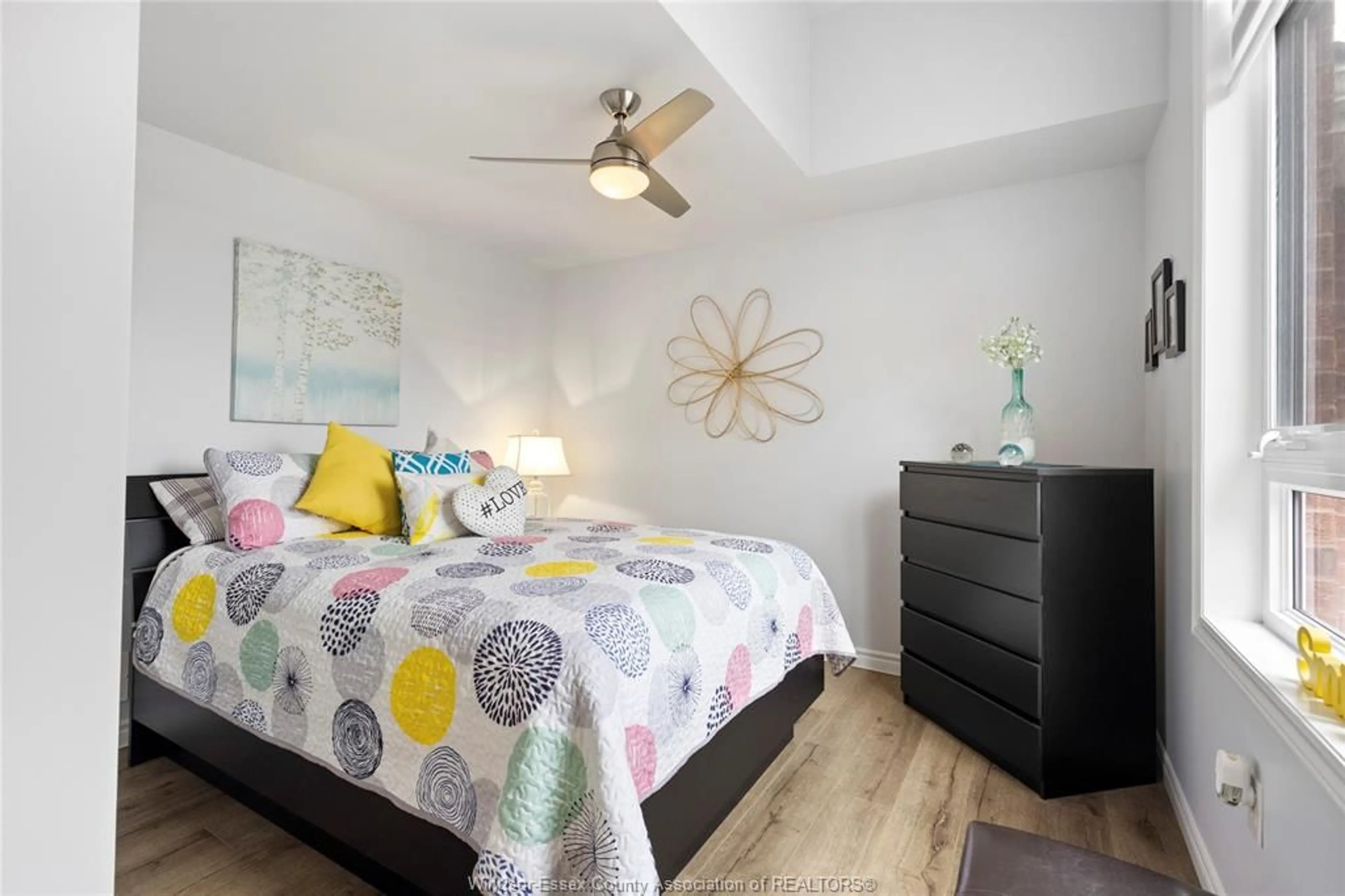 Bedroom with bed, wood/laminate floor for 132 RIVERFRONT Pk, Amherstburg Ontario N9V 0B8