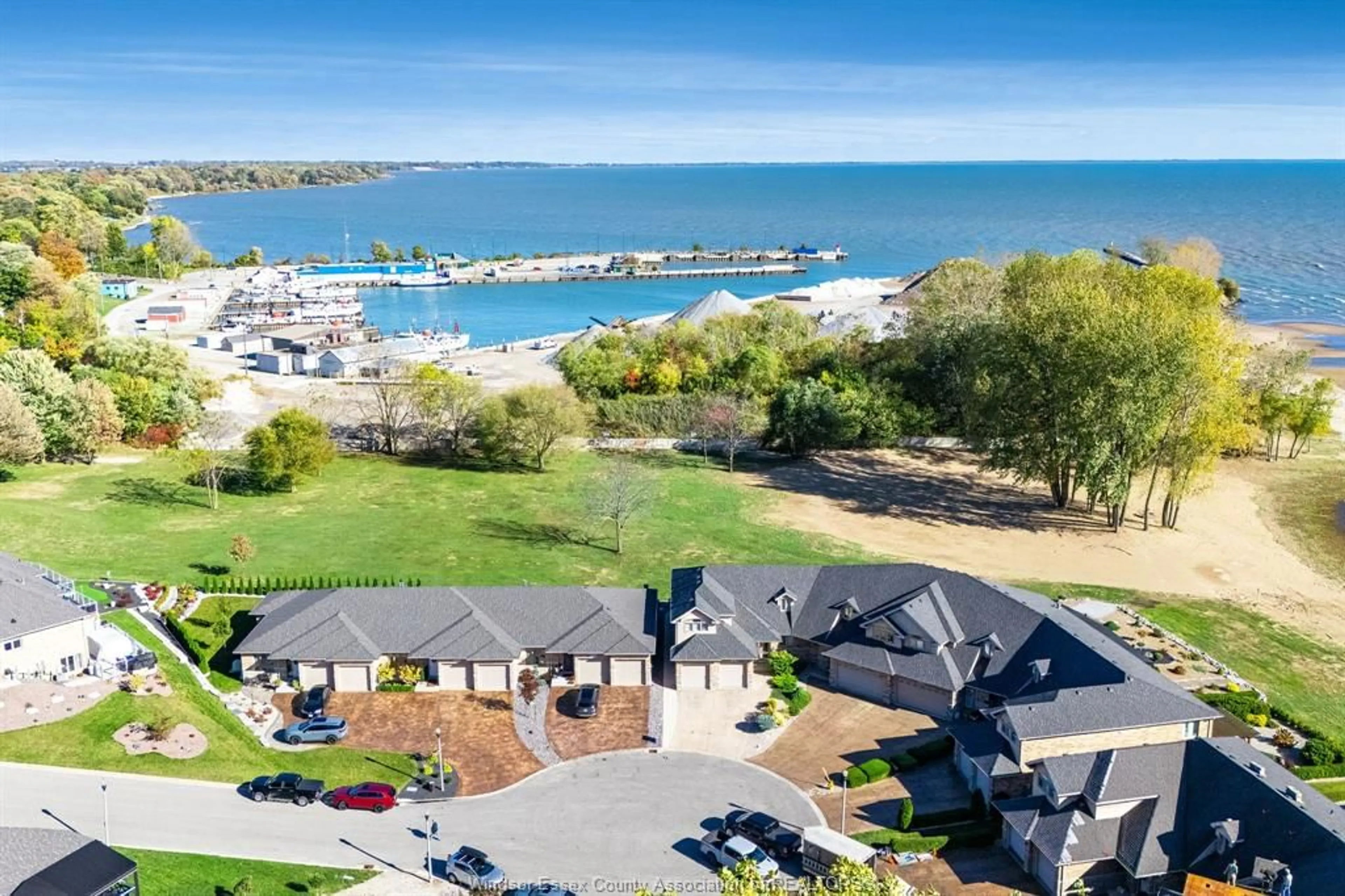 A pic from outside/outdoor area/front of a property/back of a property/a pic from drone, water/lake/river/ocean view for 7 Mettawas Lane, Kingsville Ontario N9Y 0A2