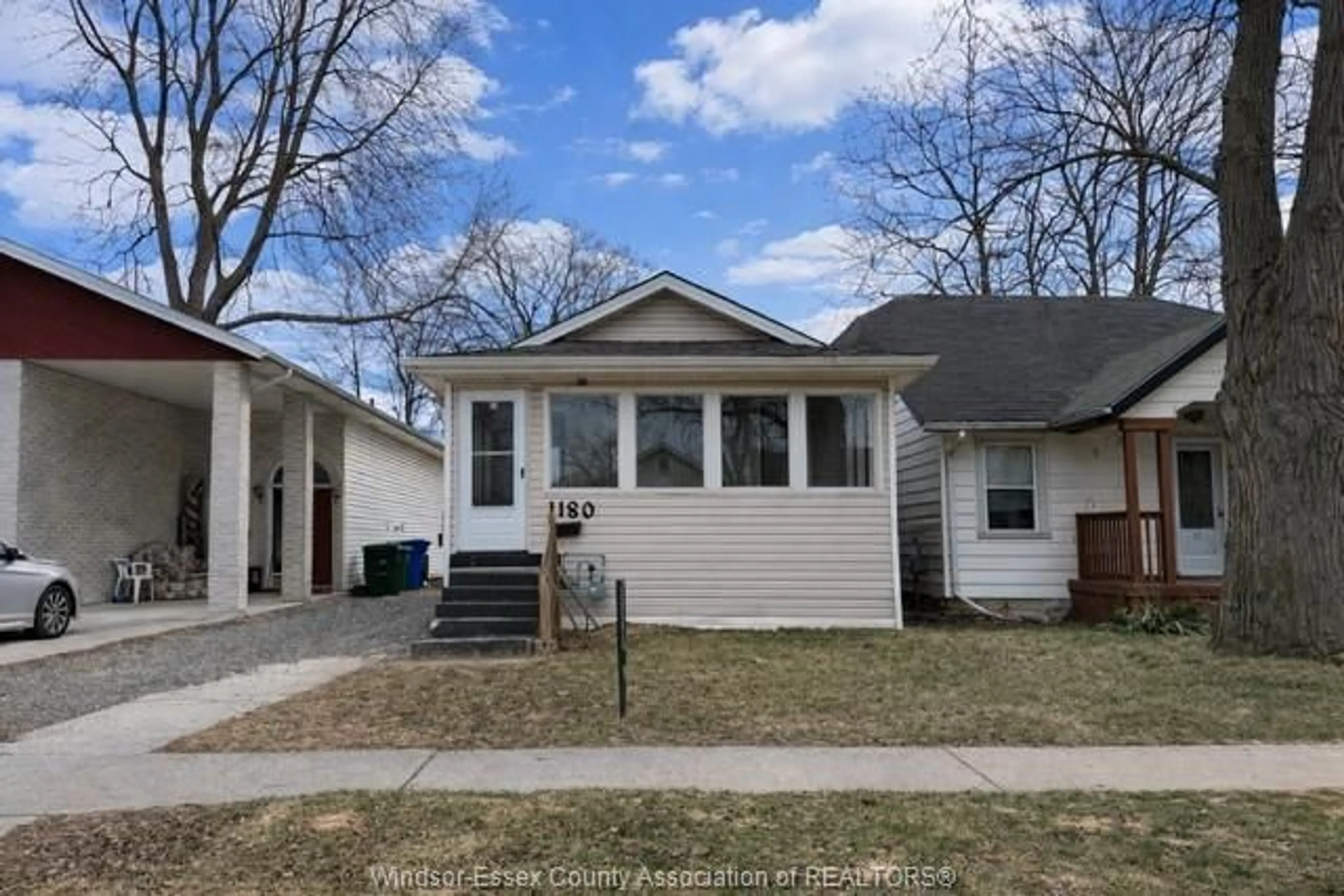 Home with vinyl exterior material, street for 1180 WIGLE Ave, Windsor Ontario N9C 3N1