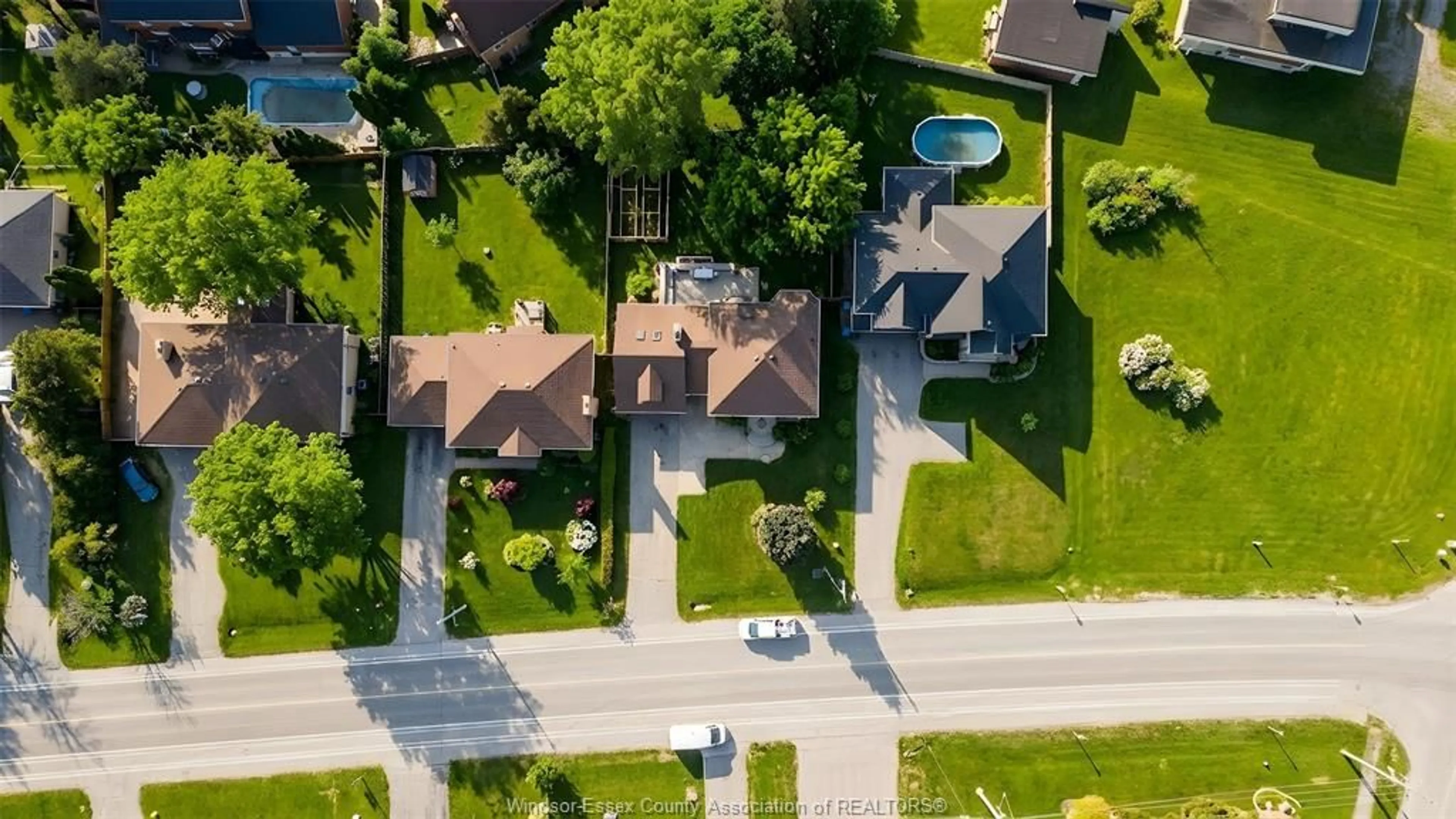A pic from outside/outdoor area/front of a property/back of a property/a pic from drone, street for 233 Old Tecumseh Rd, Lakeshore Ontario N8N 3S9