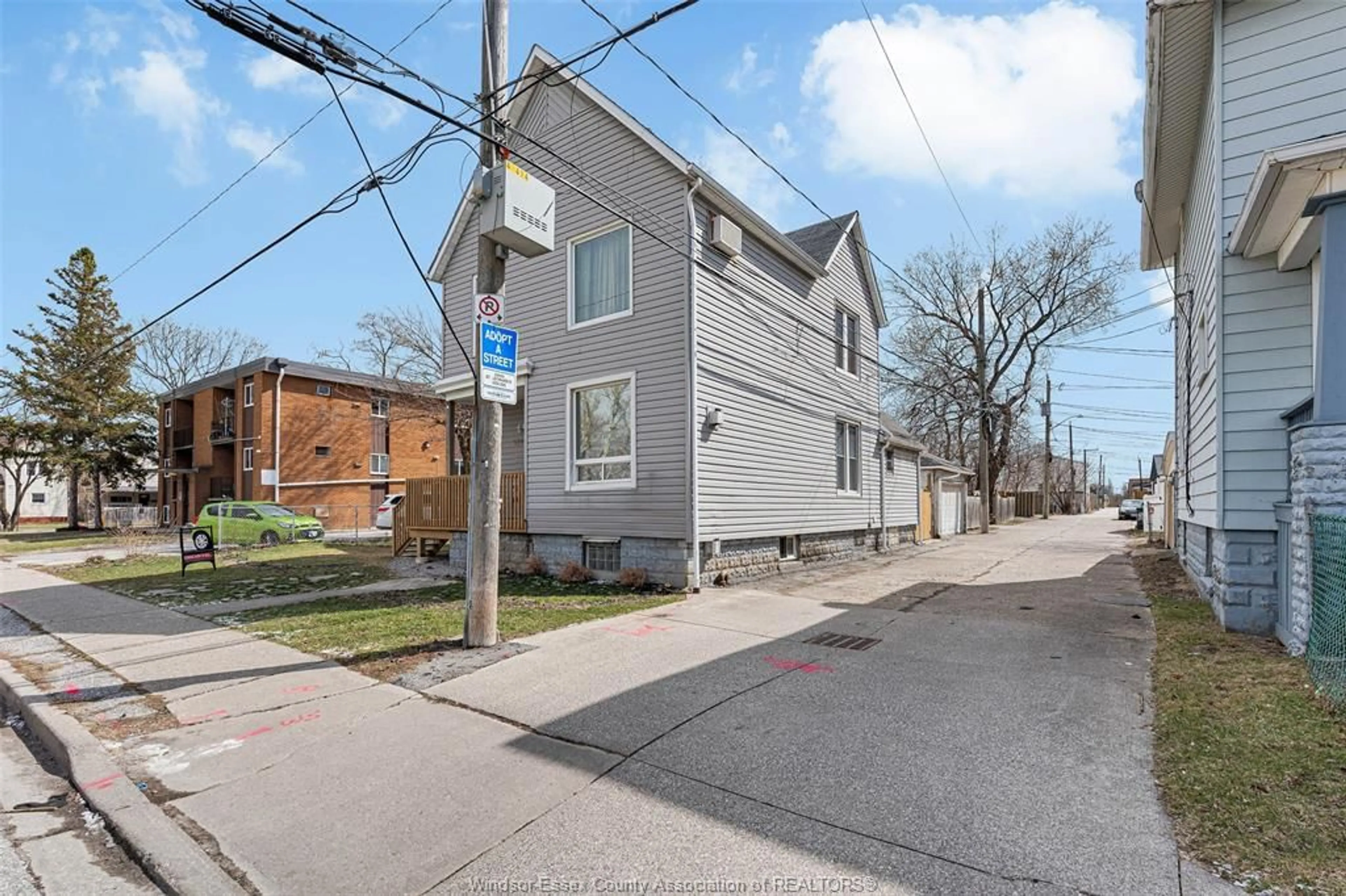 A pic from outside/outdoor area/front of a property/back of a property/a pic from drone, street for 559 ASSUMPTION, Windsor Ontario N9A 3B3