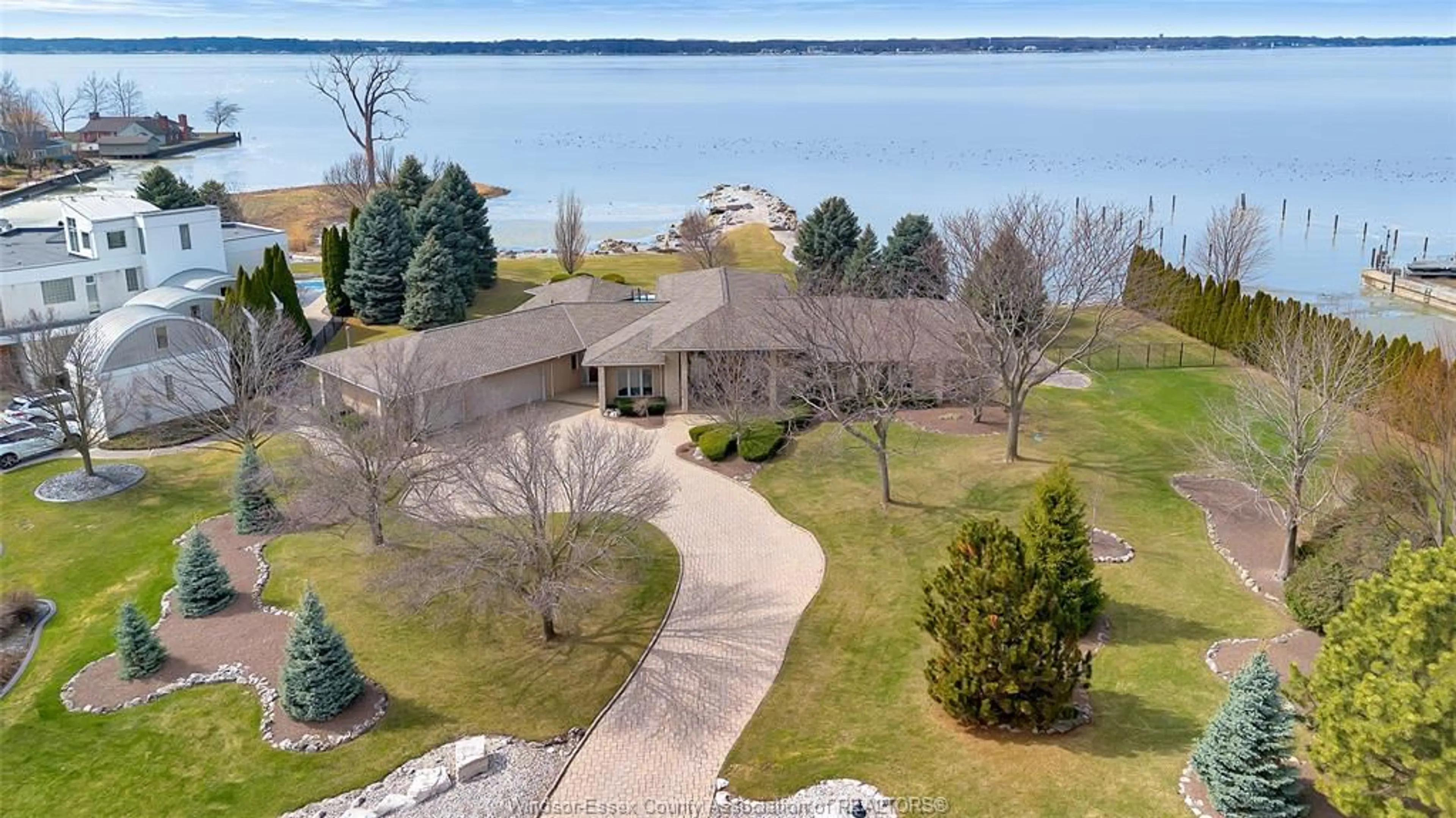 A pic from outside/outdoor area/front of a property/back of a property/a pic from drone, water/lake/river/ocean view for 30 EMERALD Lane, Amherstburg Ontario N9V 3R3