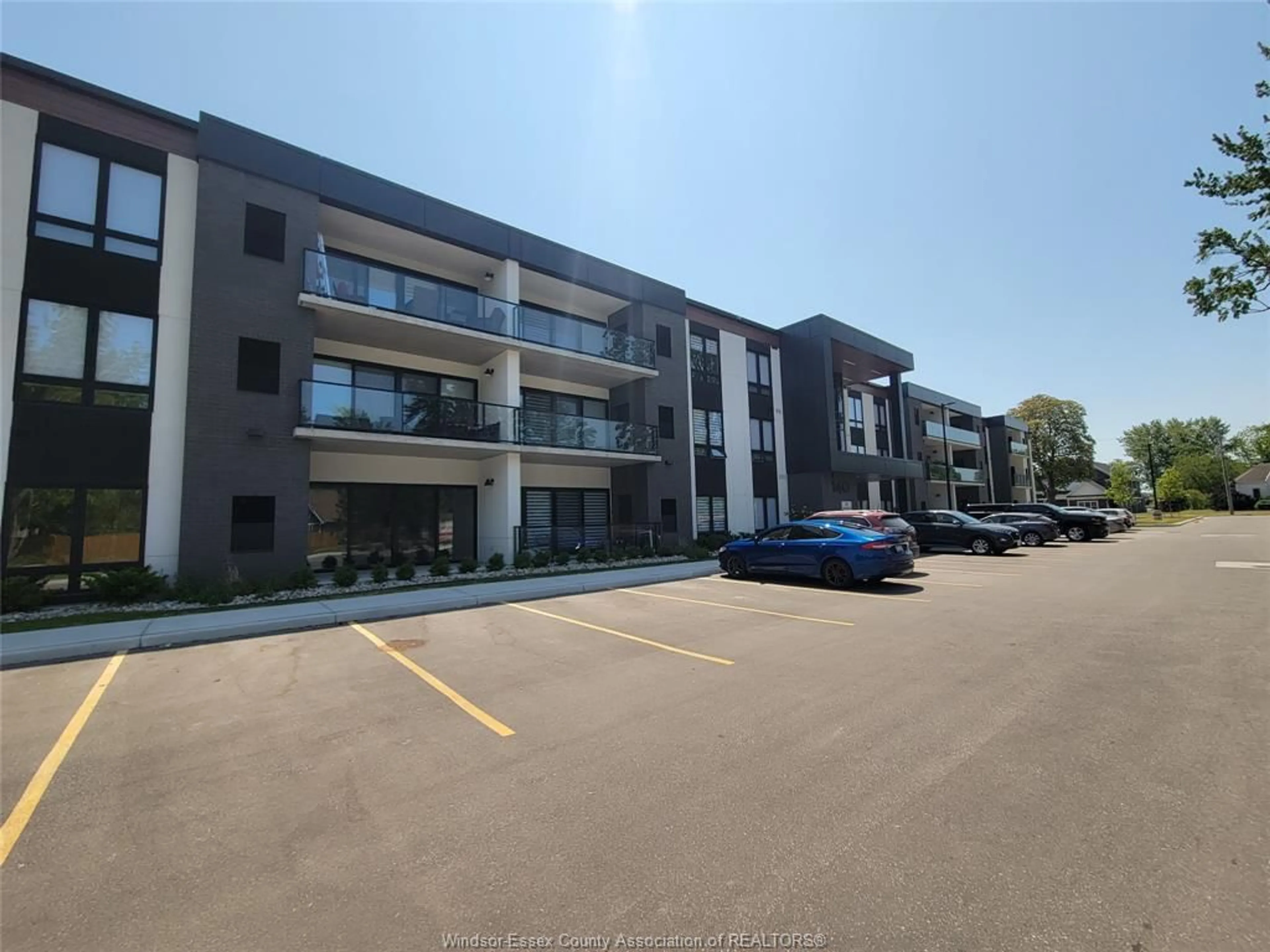 A pic from outside/outdoor area/front of a property/back of a property/a pic from drone, building for 140 Main St #304, Kingsville Ontario N9Y 1A6