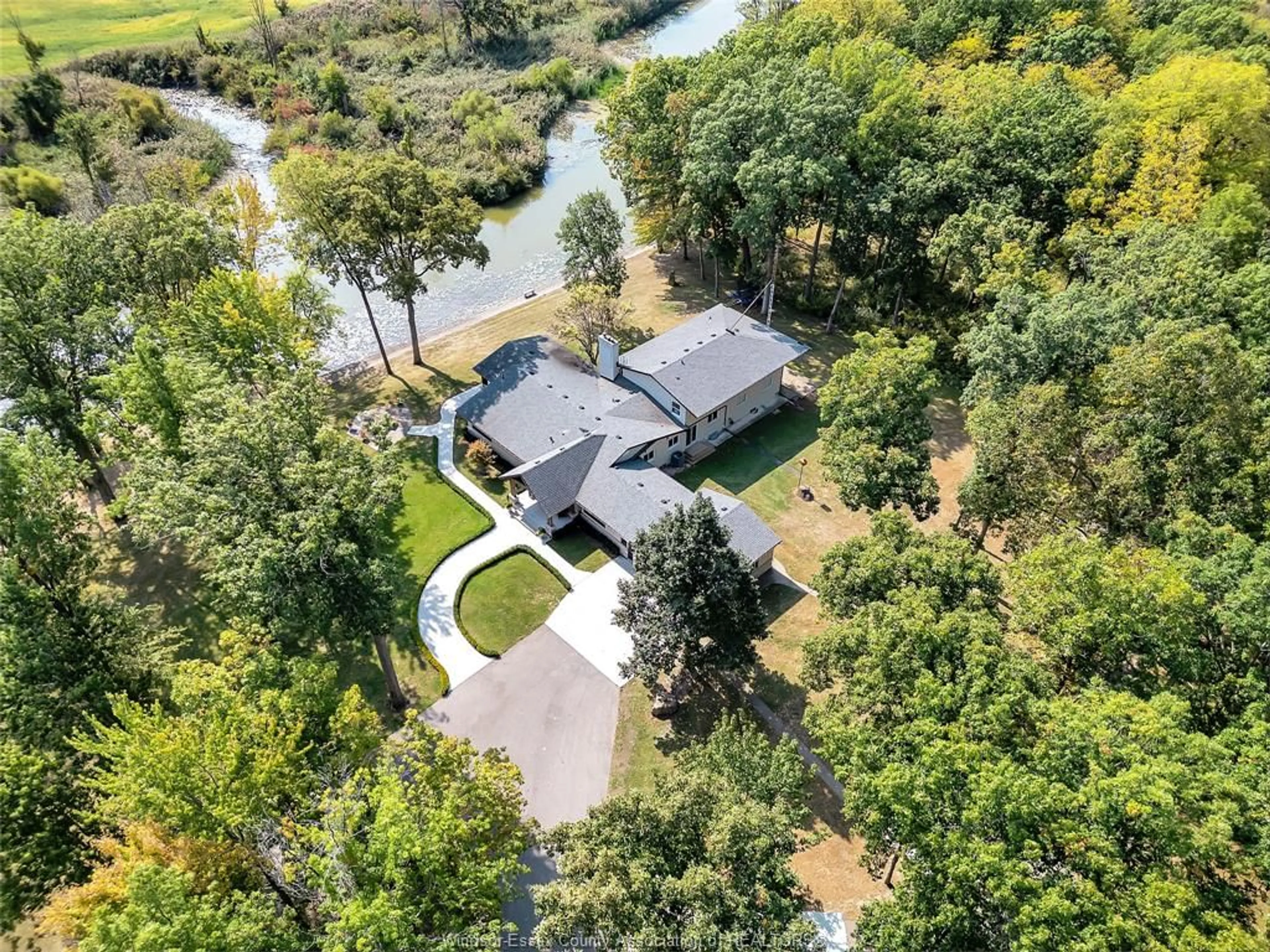 A pic from outside/outdoor area/front of a property/back of a property/a pic from drone, water/lake/river/ocean view for 5938 CONCESSION 5, Amherstburg Ontario N9V 2Y9