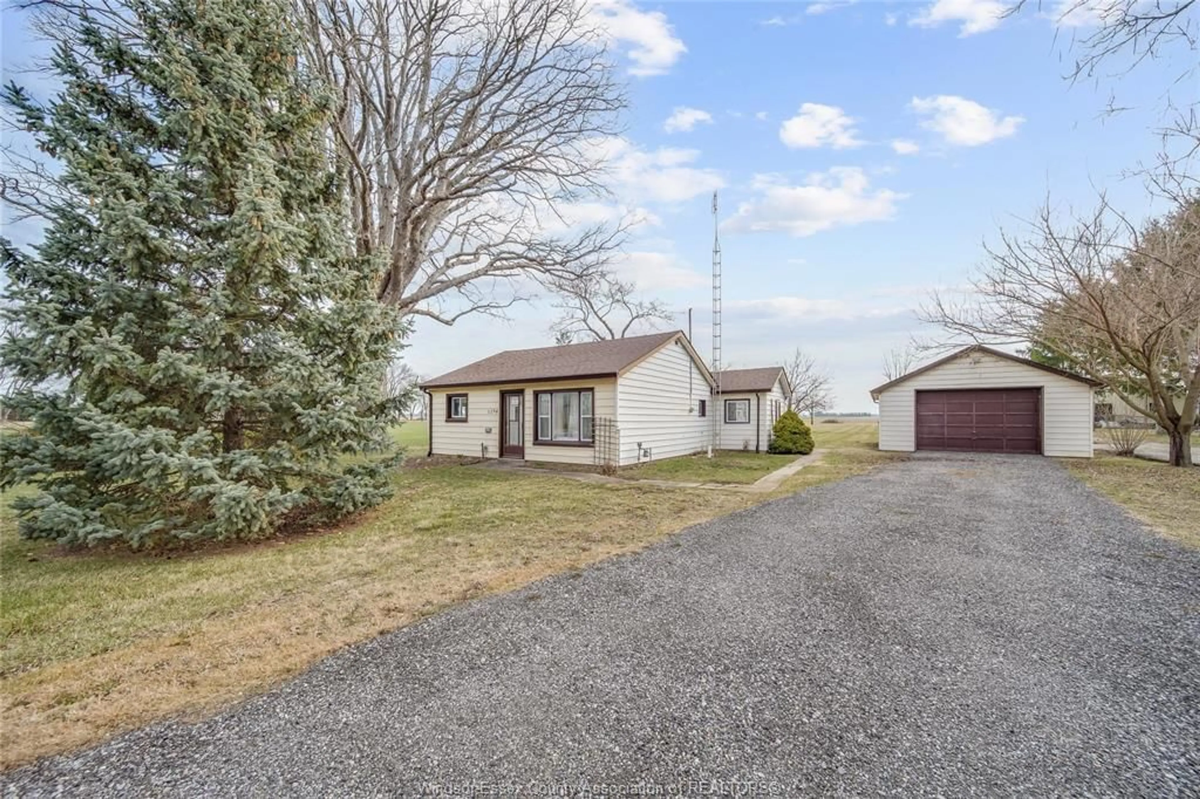 A pic from outside/outdoor area/front of a property/back of a property/a pic from drone, street for 1294 COUNTY RD 27, Lakeshore Ontario N8L 1B7