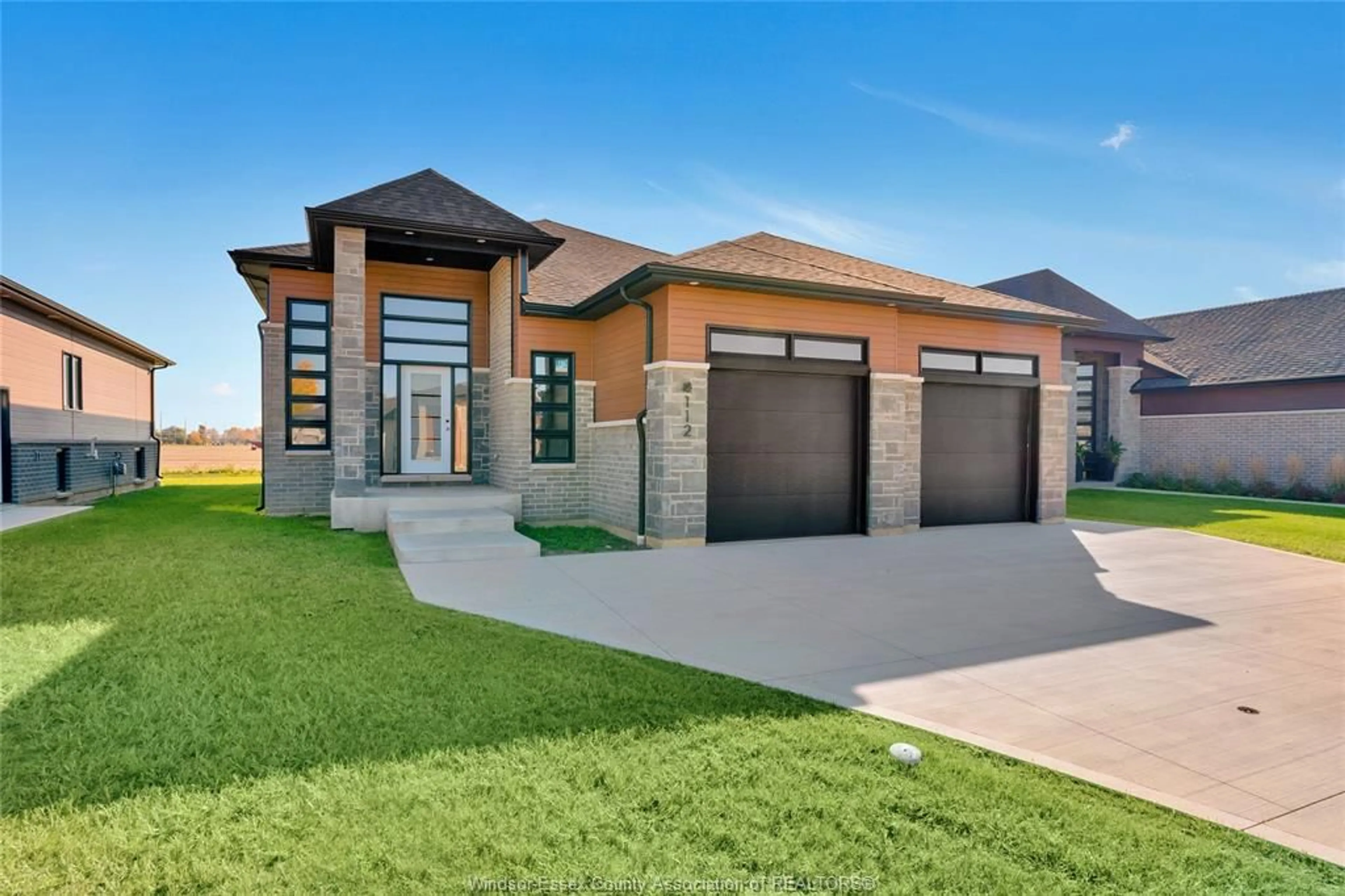 Home with brick exterior material, street for 112 HAZEL CRES, Kingsville Ontario N9Y 0A9