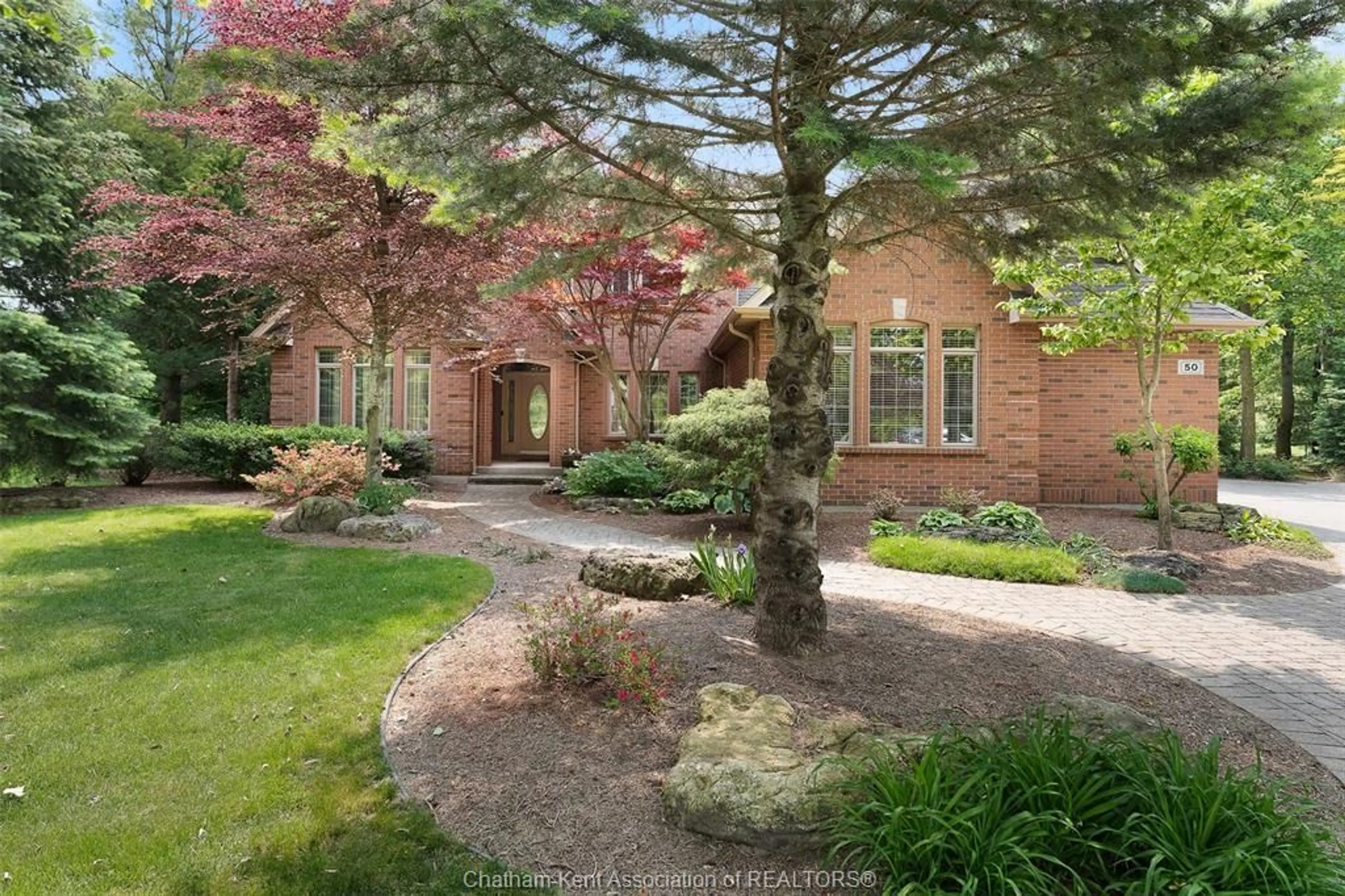 Home with brick exterior material, street for 50 St Andrews Pl, Chatham Ontario N7M 6K2