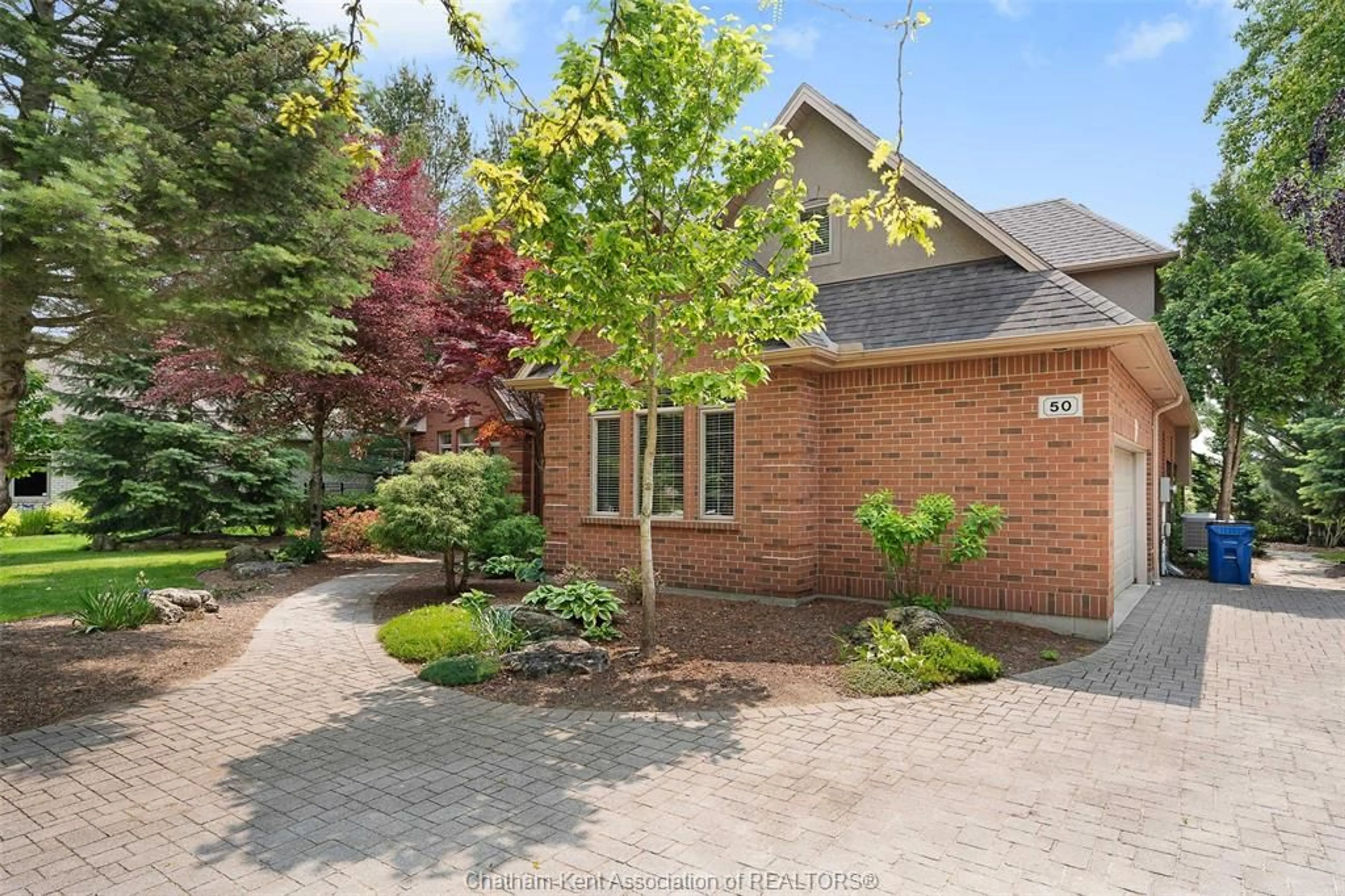 Home with brick exterior material, street for 50 St Andrews Pl, Chatham Ontario N7M 6K2