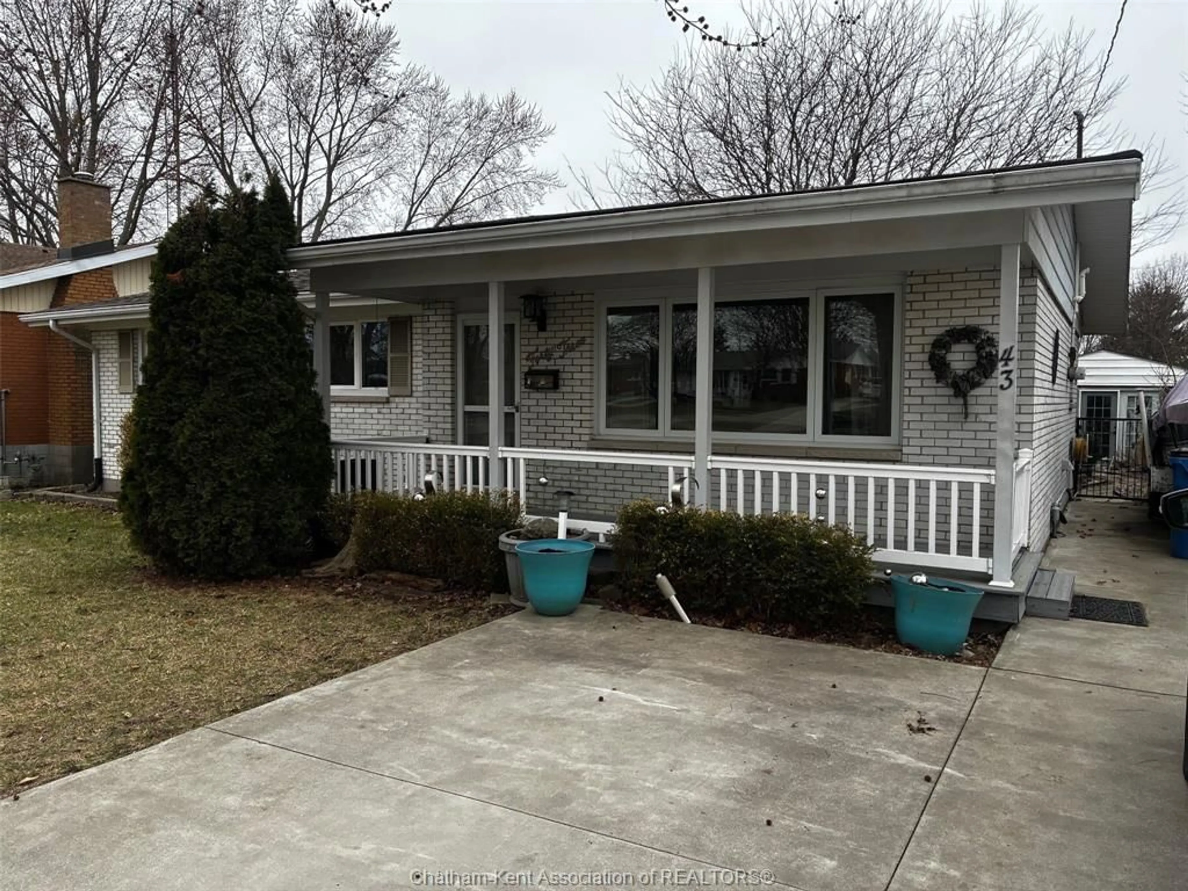 Home with vinyl exterior material, street for 43 Highland Dr, Wallaceburg Ontario N8A 2K4