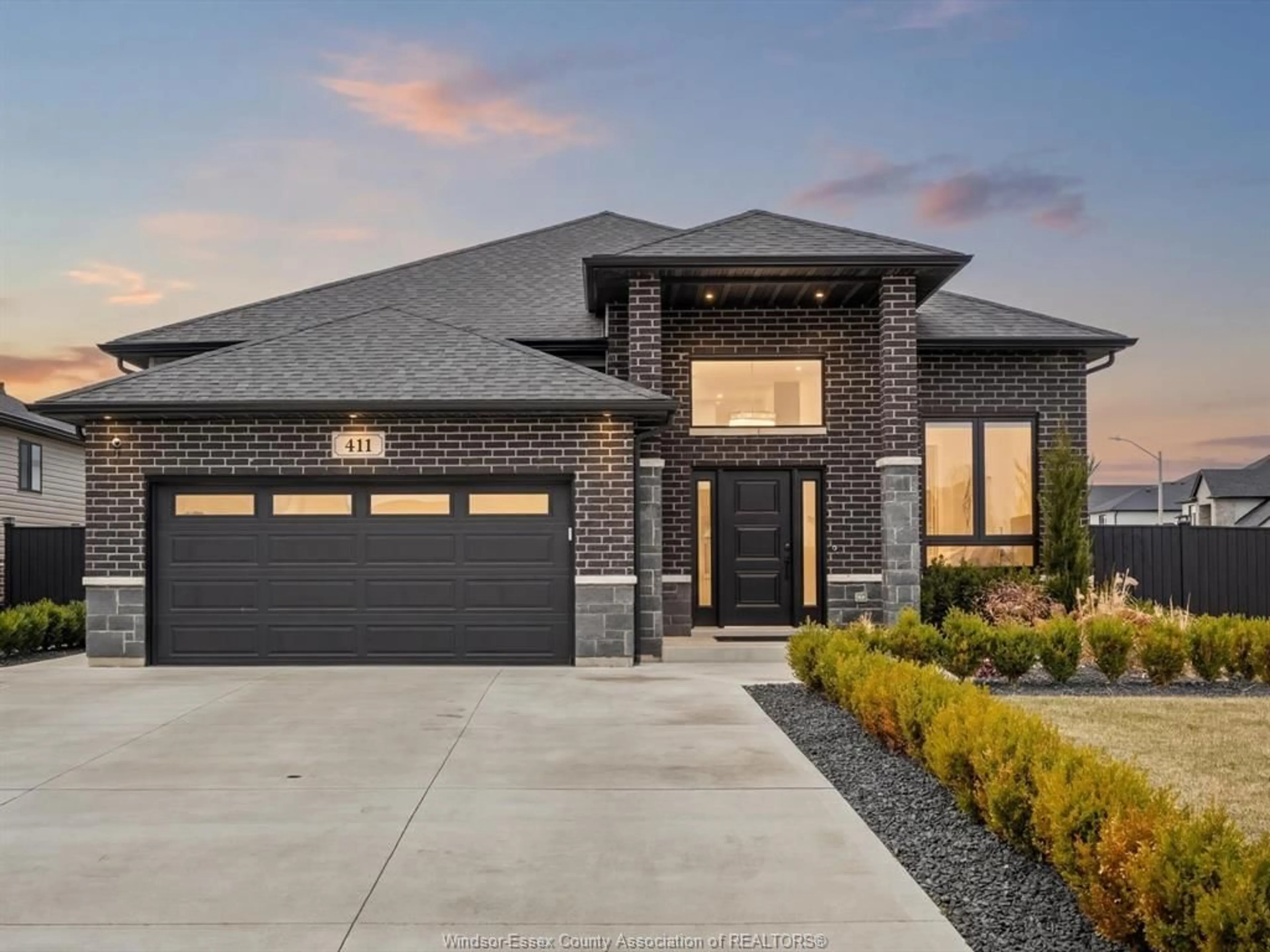 Home with brick exterior material, street for 411 Thompson Ave, Amherstburg Ontario N9V 0G8