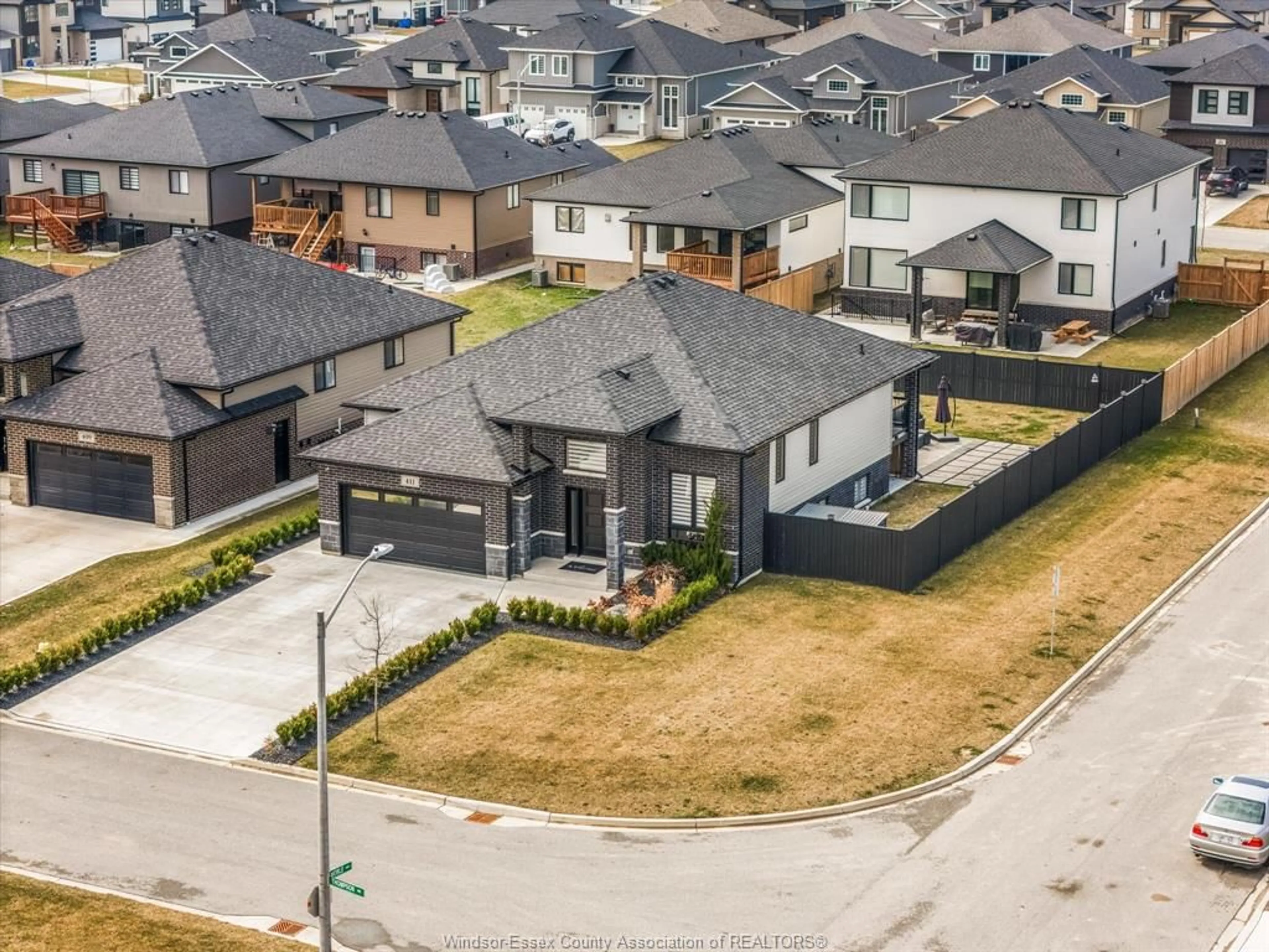 A pic from outside/outdoor area/front of a property/back of a property/a pic from drone, street for 411 Thompson Ave, Amherstburg Ontario N9V 0G8