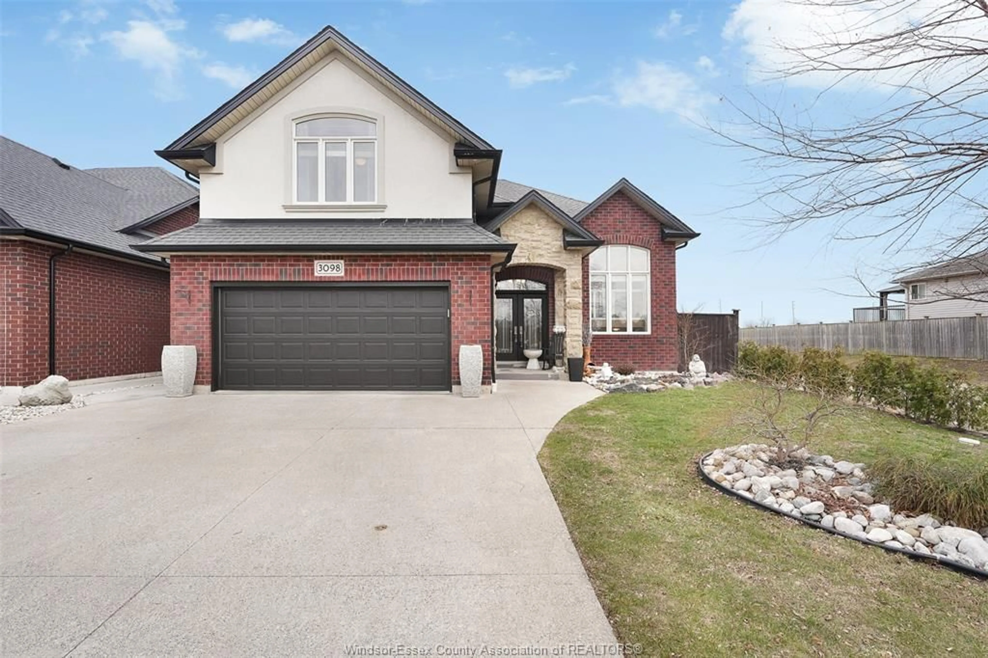 Home with brick exterior material, street for 3098 Troup Cres, Windsor Ontario N8R 0A3