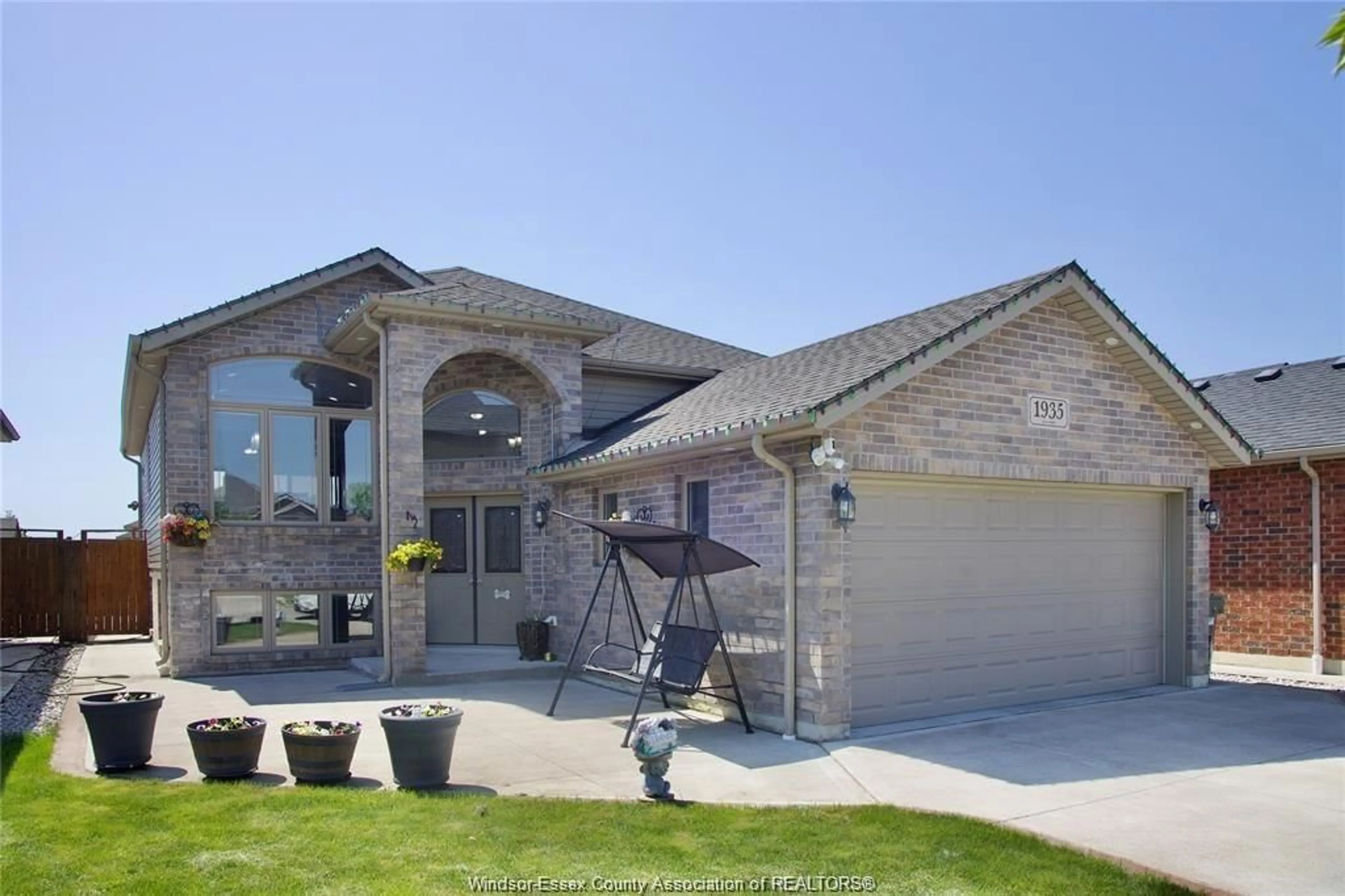 Home with brick exterior material, street for 1935 MANITOBA, Windsor Ontario N9B 3H8