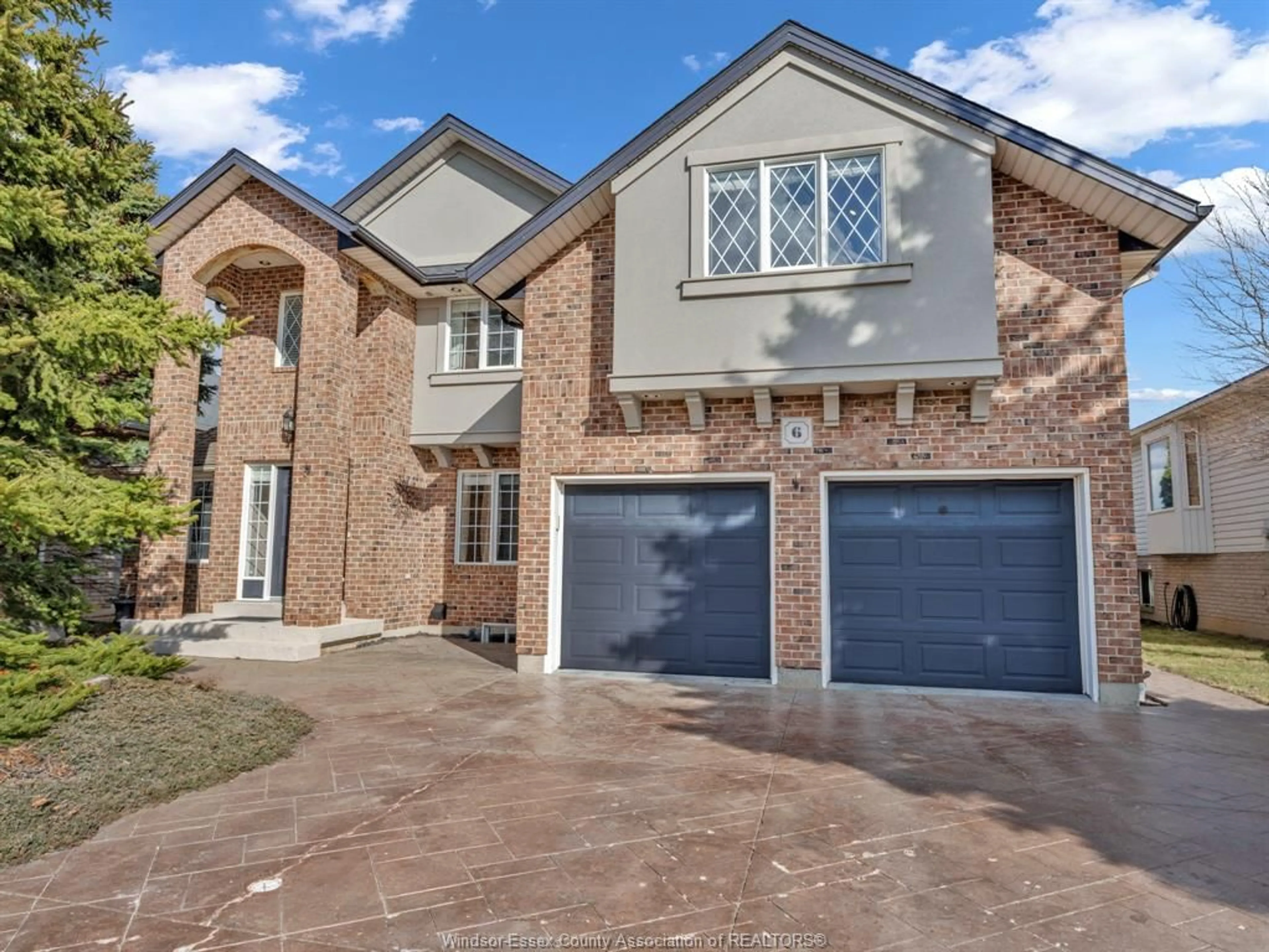 Home with brick exterior material, street for 6 MARIE Cres, Leamington Ontario N8H 5J2