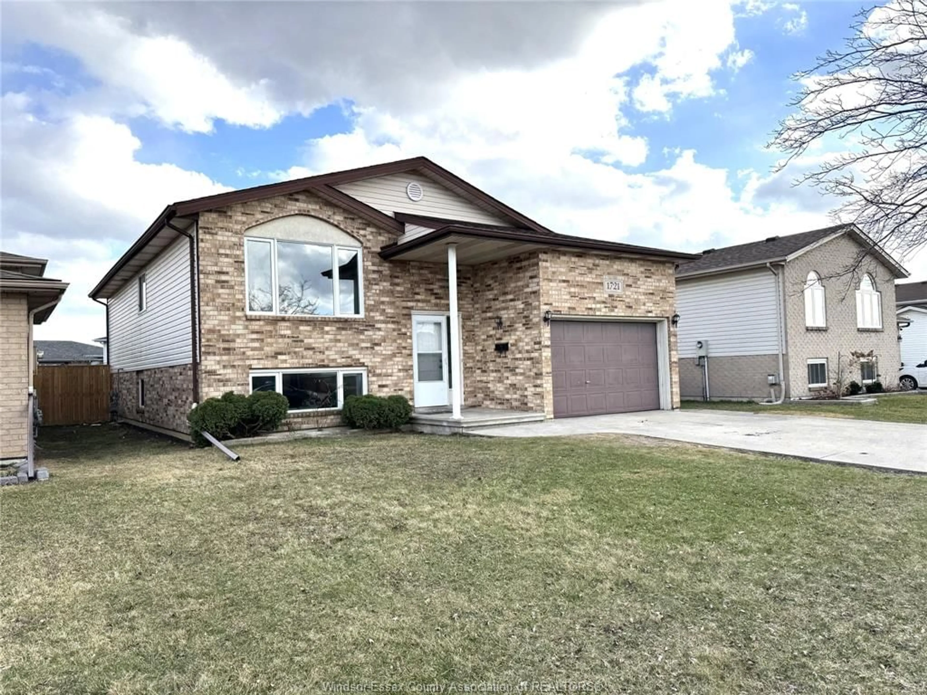 Home with vinyl exterior material, street for 1721 FOSTER Ave, Windsor Ontario N8W 5P9