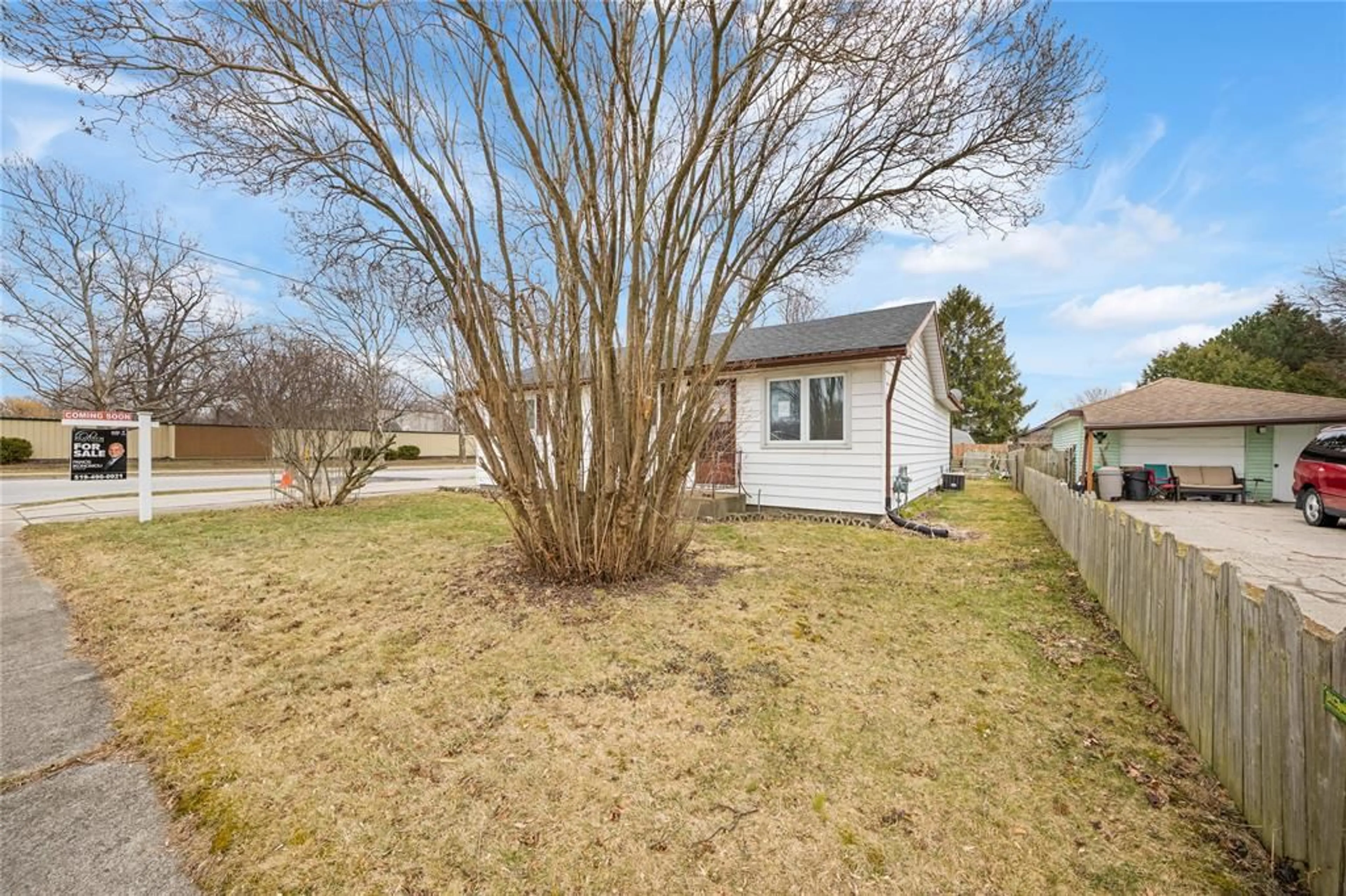A pic from outside/outdoor area/front of a property/back of a property/a pic from drone, street for 723 BENGARVIE St, Point Edward Ontario N7V 1B3