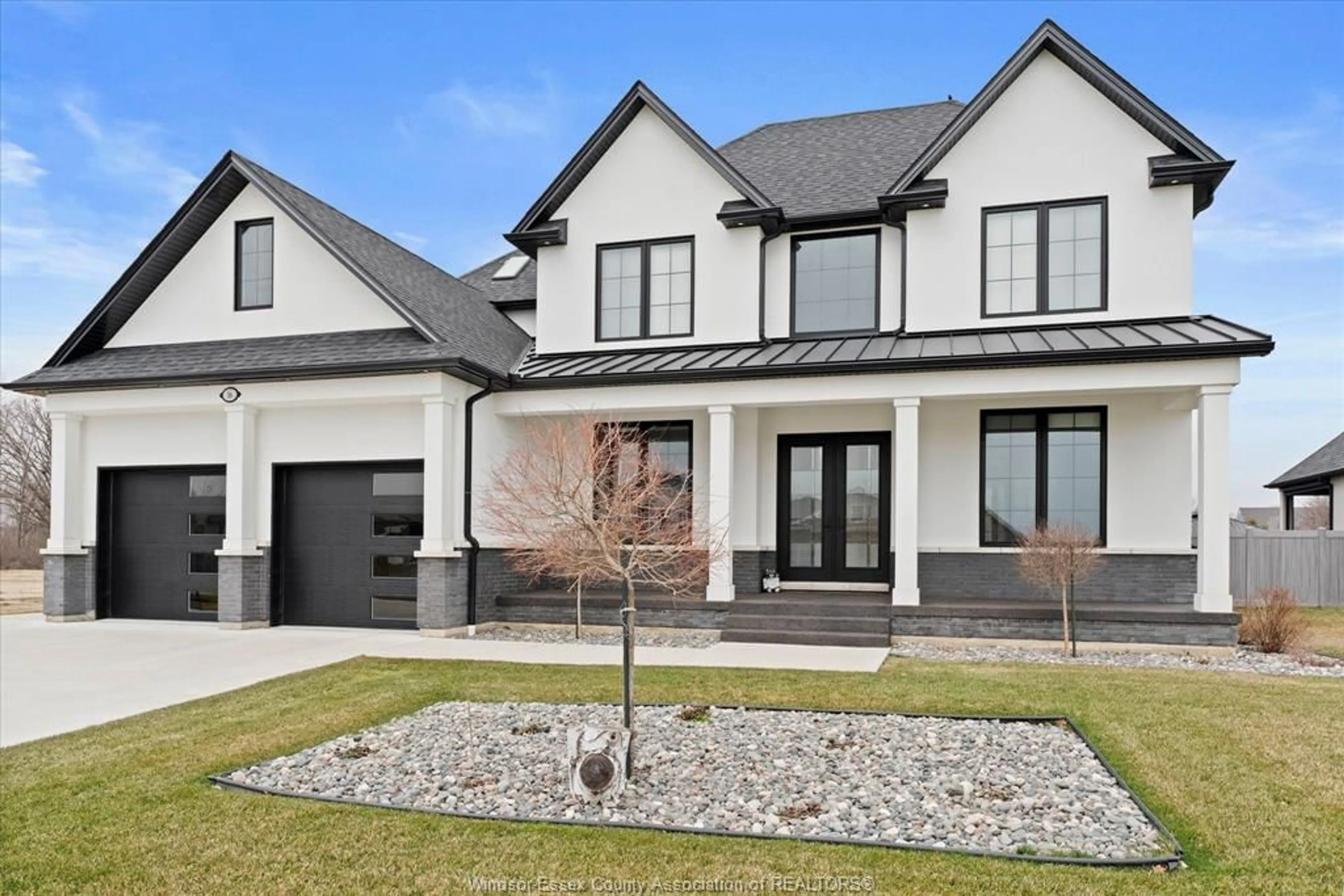 Home with brick exterior material, street for 16 YORK Blvd, Kingsville Ontario N9Y 0E5