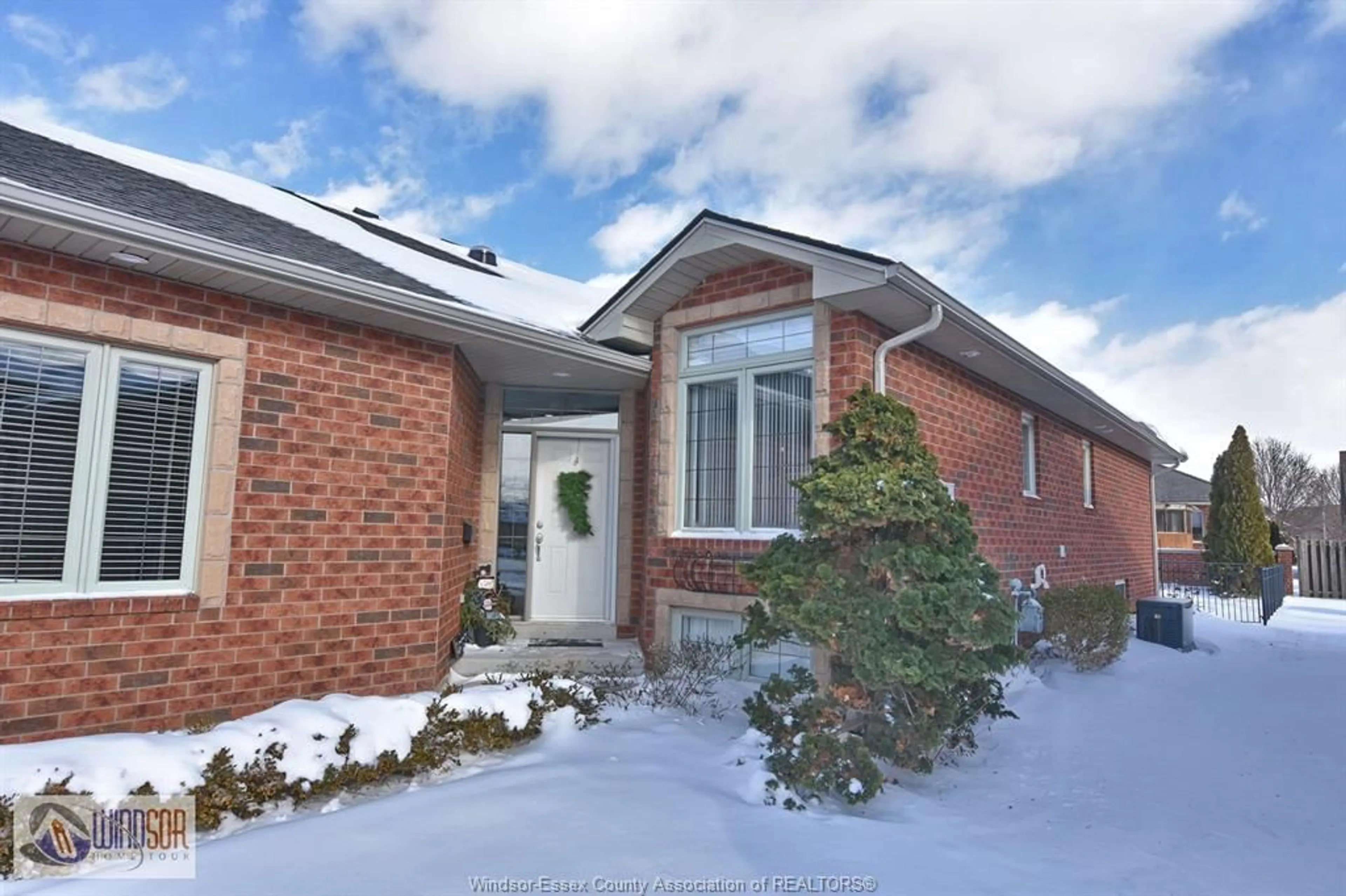 Home with brick exterior material, street for 135 WOODYCREST, Kingsville Ontario N9Y 4G3