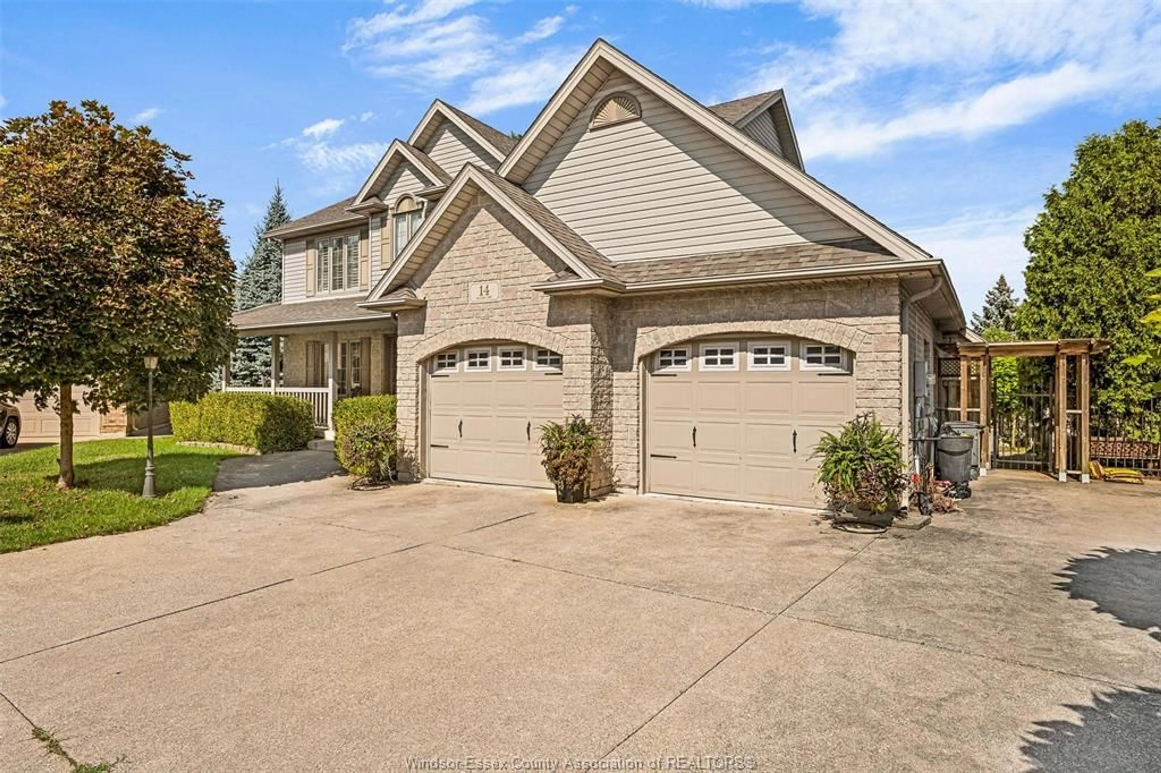 Home with brick exterior material, street for 14 WILLOW Cres, Essex Ontario N8M 3C4