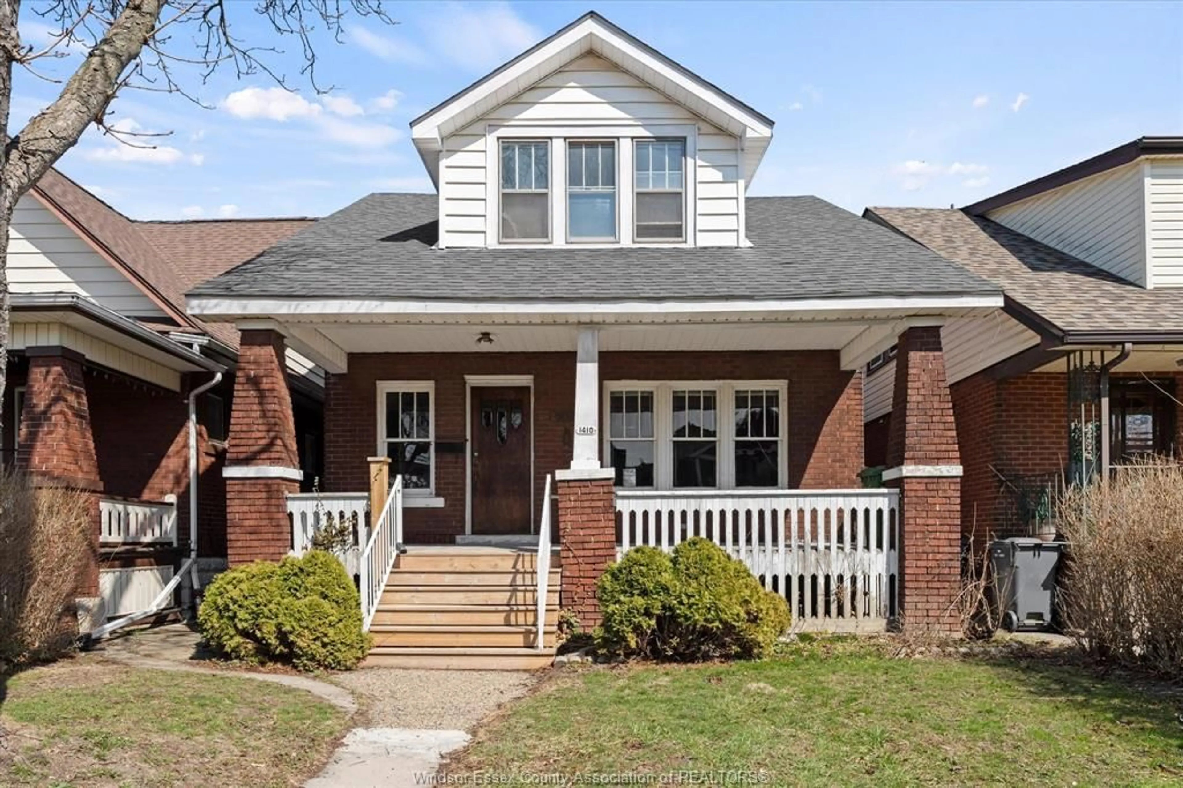 Home with brick exterior material, street for 1410 Benjamin Ave, Windsor Ontario N8X 4N1