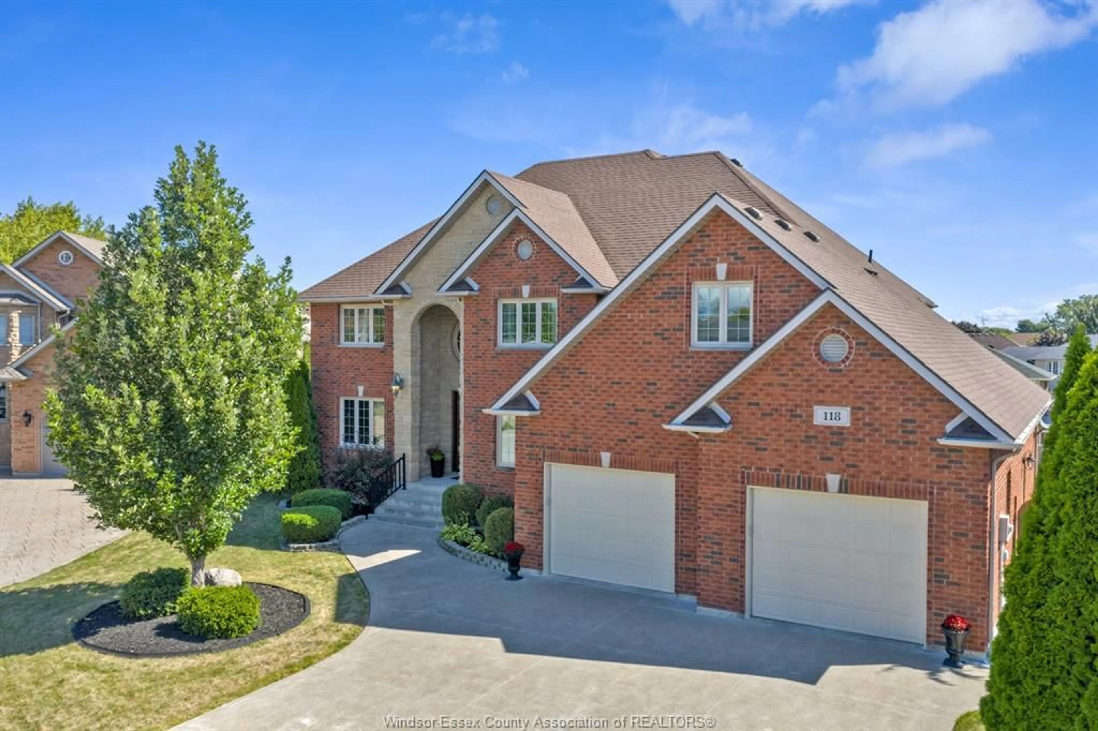 Home with brick exterior material, street for 118 REMO Cres, Lakeshore Ontario N8L 0Z3