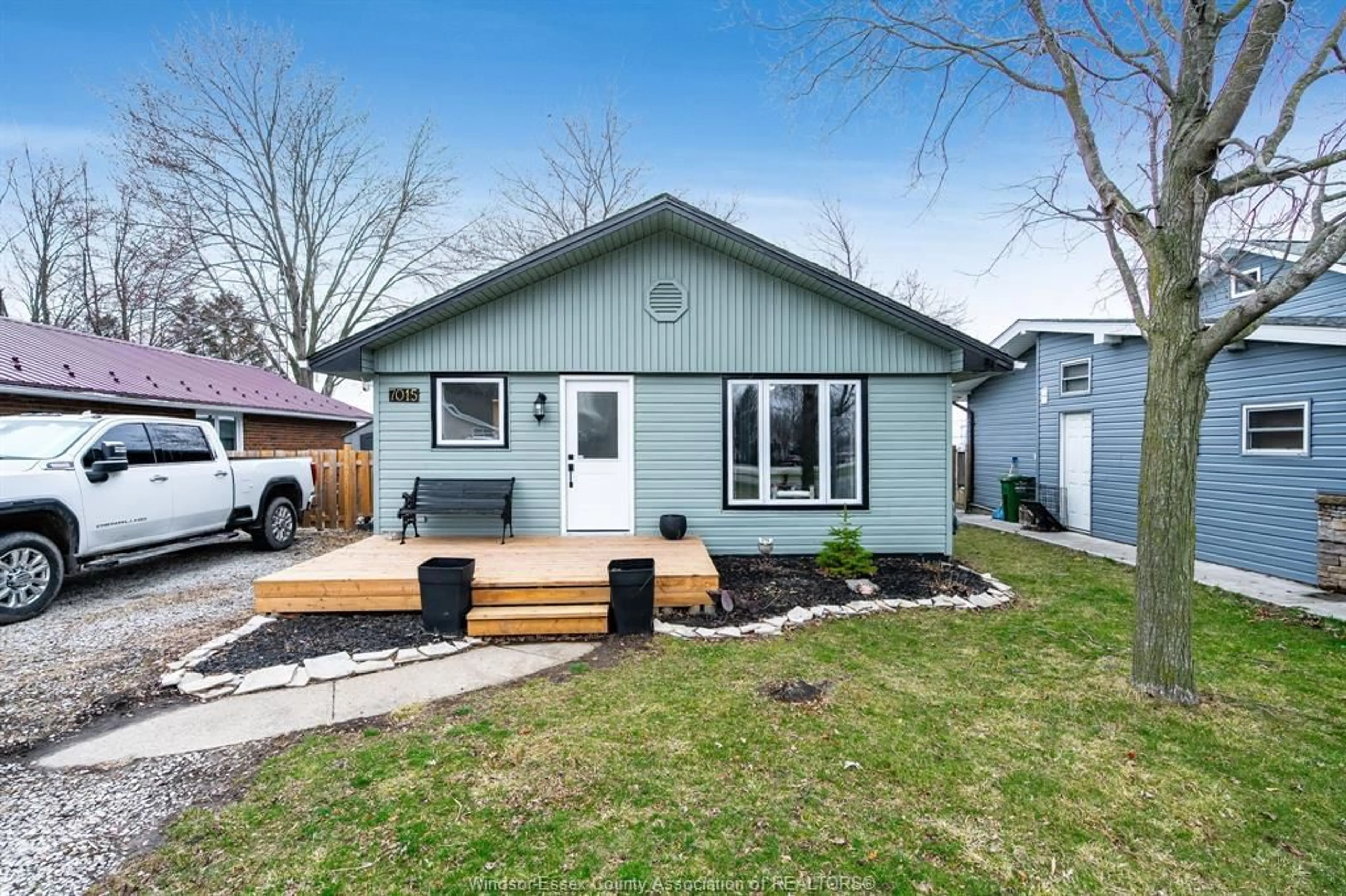 Home with vinyl exterior material, street for 7015 Main St, Comber Ontario N0P 1J0