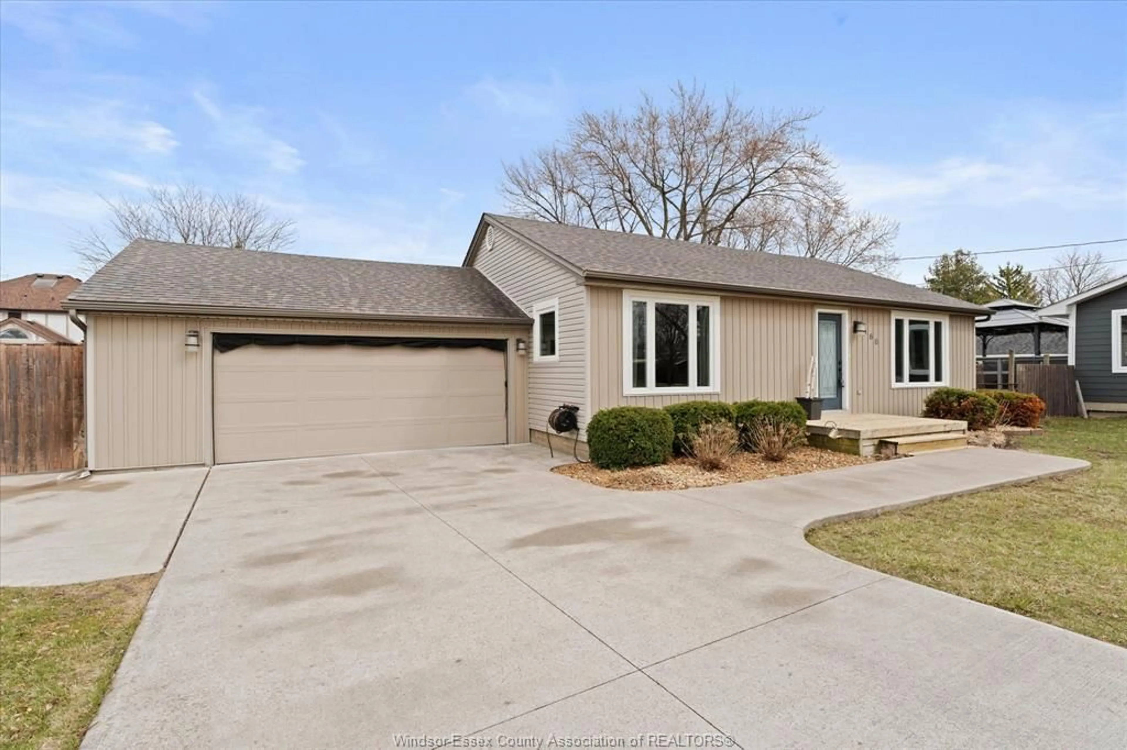 Home with vinyl exterior material, street for 466 St. Pierre, Tecumseh Ontario N8N 1Y9