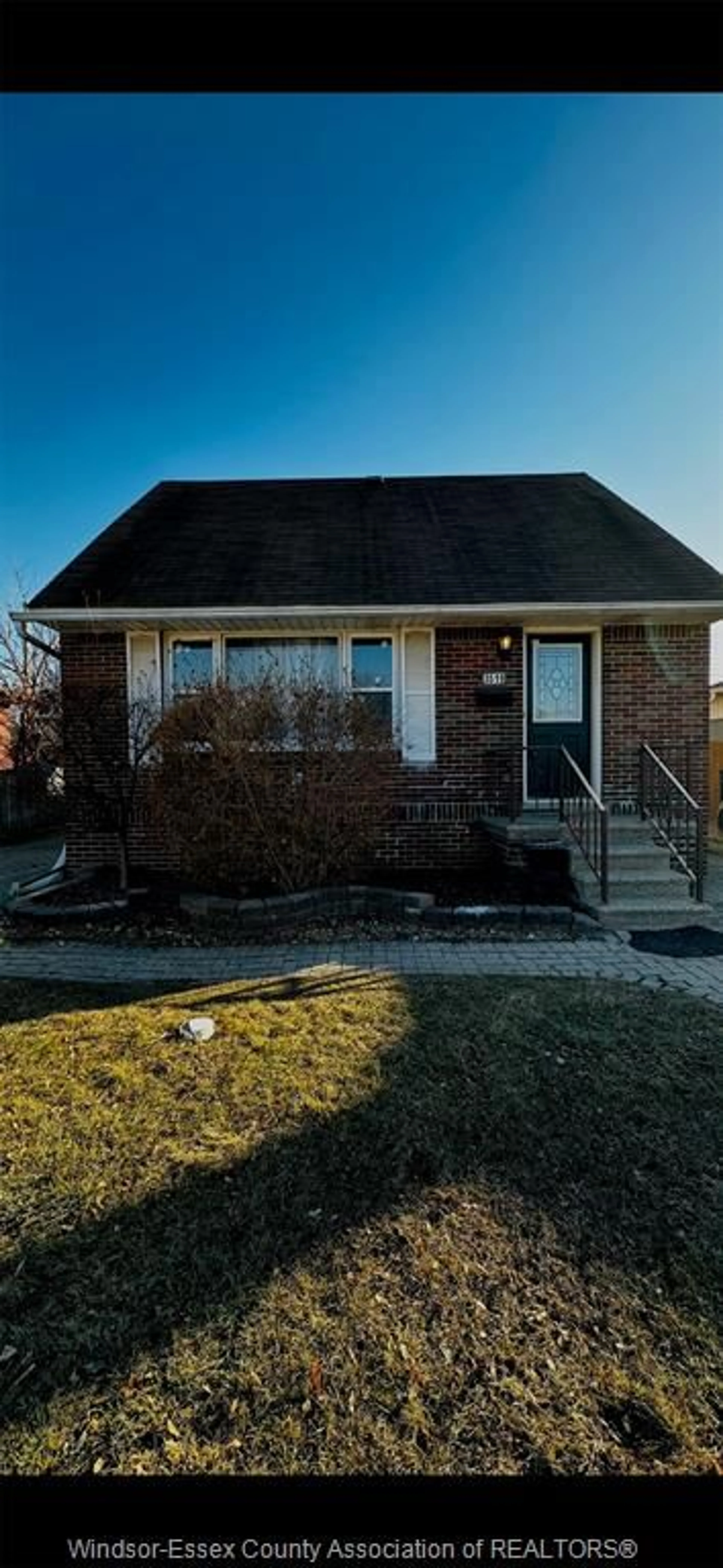 Home with brick exterior material, street for 3519 TECUMSEH Rd, Windsor Ontario N9C 2B6